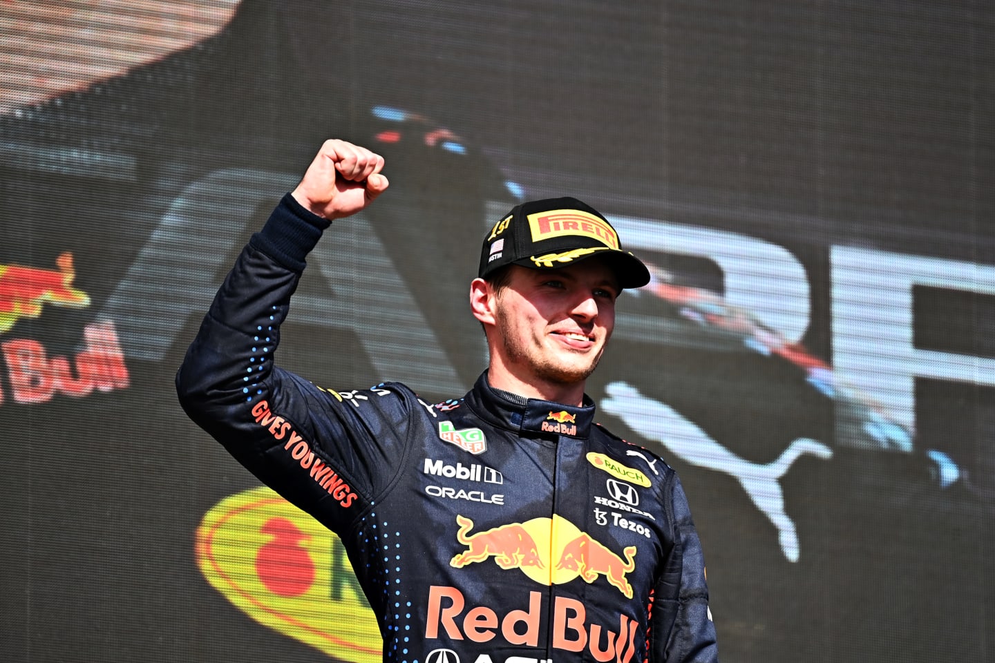 AUSTIN, TEXAS - OCTOBER 24: Race winner Max Verstappen of Netherlands and Red Bull Racing celebrates on the podium during the F1 Grand Prix of USA at Circuit of The Americas on October 24, 2021 in Austin, Texas. (Photo by Clive Mason - Formula 1/Formula 1 via Getty Images)