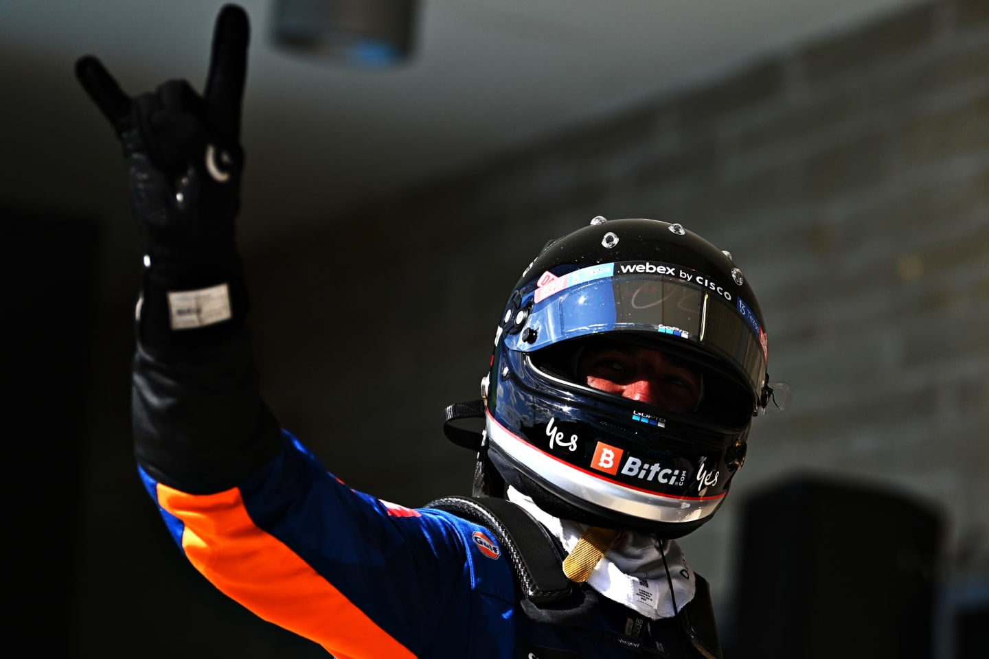 AUSTIN, TEXAS - OCTOBER 24: Daniel Ricciardo of Australia and McLaren F1 waves to the crowd from parc ferme during the F1 Grand Prix of USA at Circuit of The Americas on October 24, 2021 in Austin, Texas. (Photo by Clive Mason - Formula 1/Formula 1 via Getty Images)