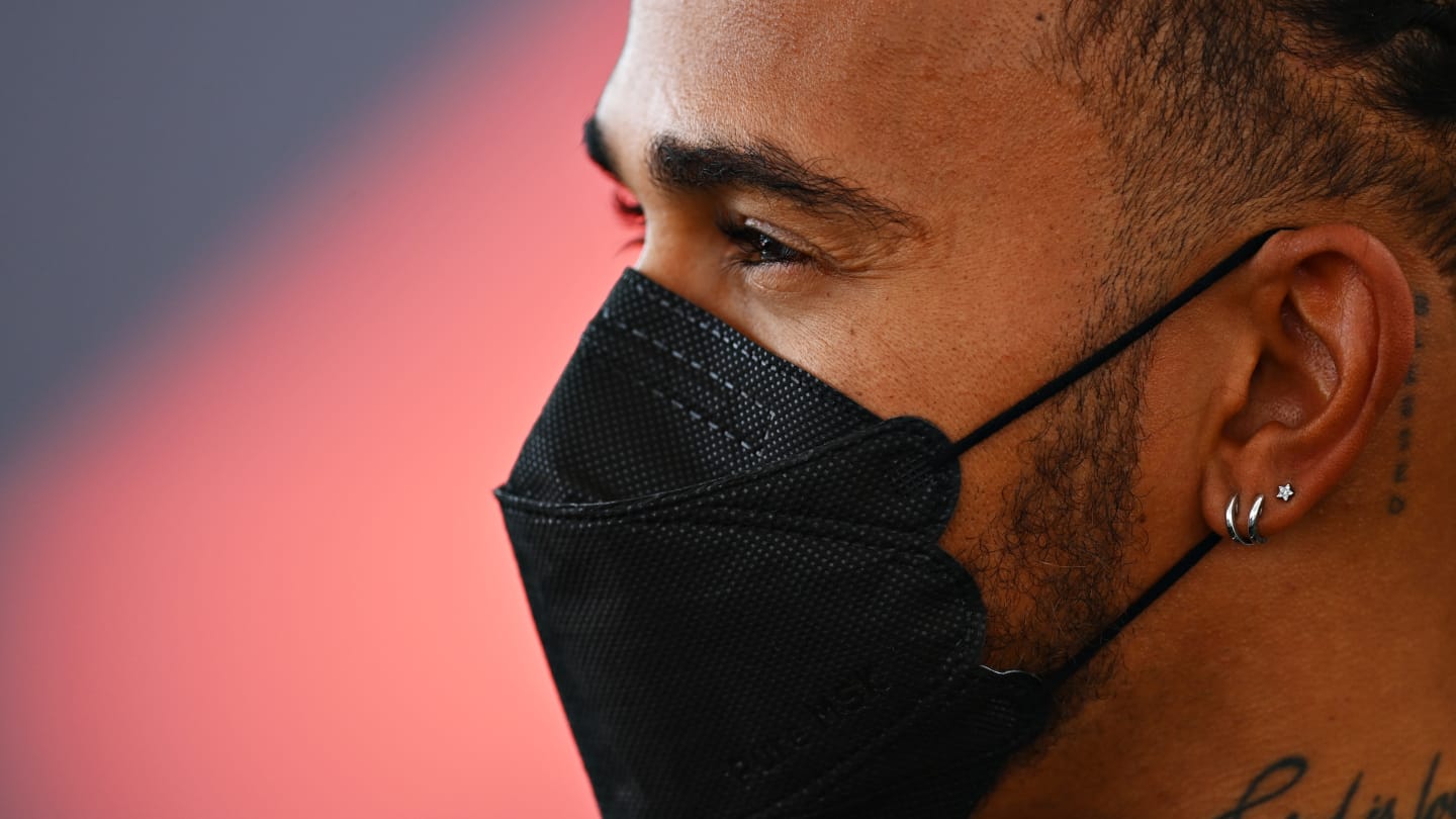 AUSTIN, TEXAS - OCTOBER 21: Lewis Hamilton of Great Britain and Mercedes GP looks on in the Paddock