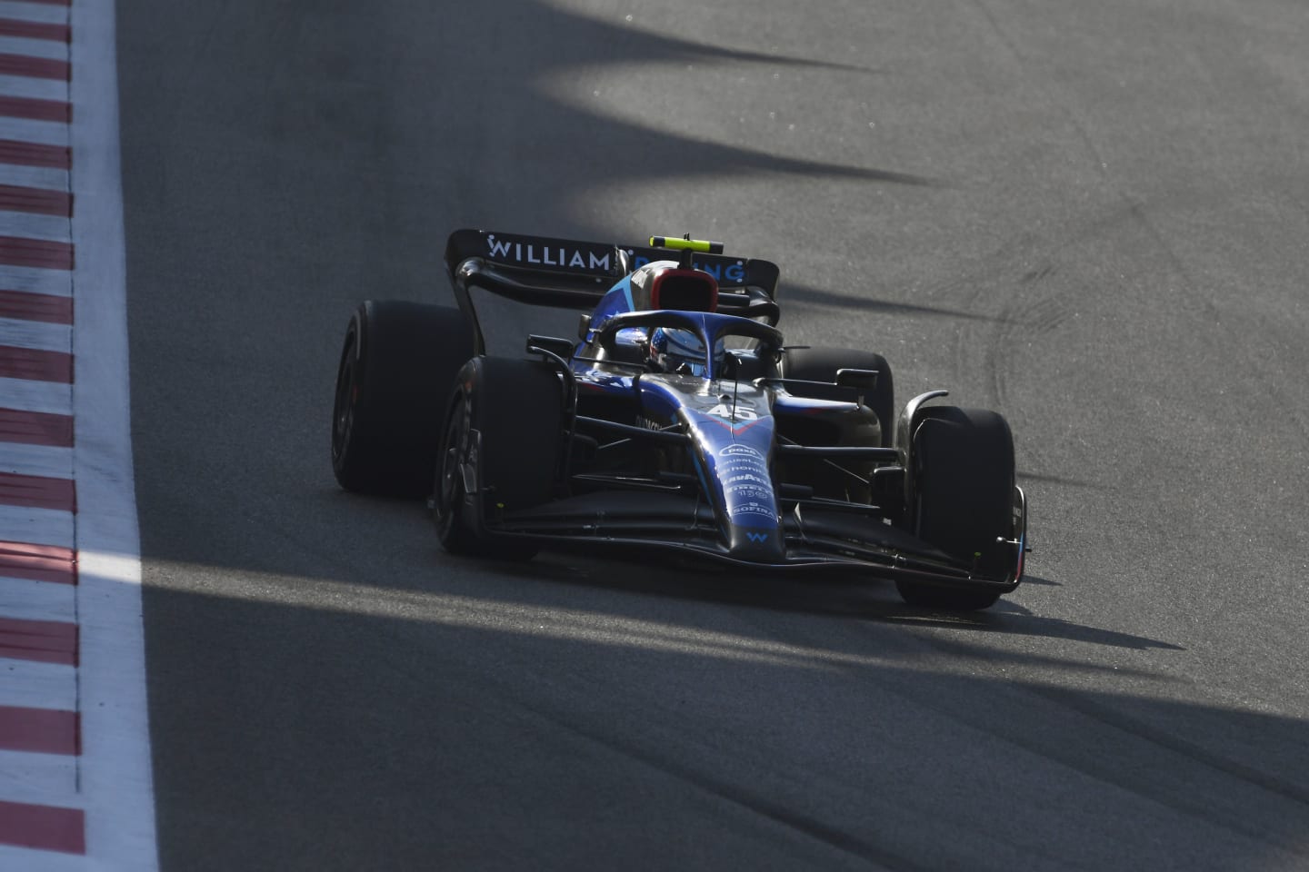 ABU DHABI, UNITED ARAB EMIRATES - NOVEMBER 18: Logan Sargeant of United States driving the (45) Williams FW44 Mercedes on track during practice ahead of the F1 Grand Prix of Abu Dhabi at Yas Marina Circuit on November 18, 2022 in Abu Dhabi, United Arab Emirates. (Photo by Rudy Carezzevoli/Getty Images)