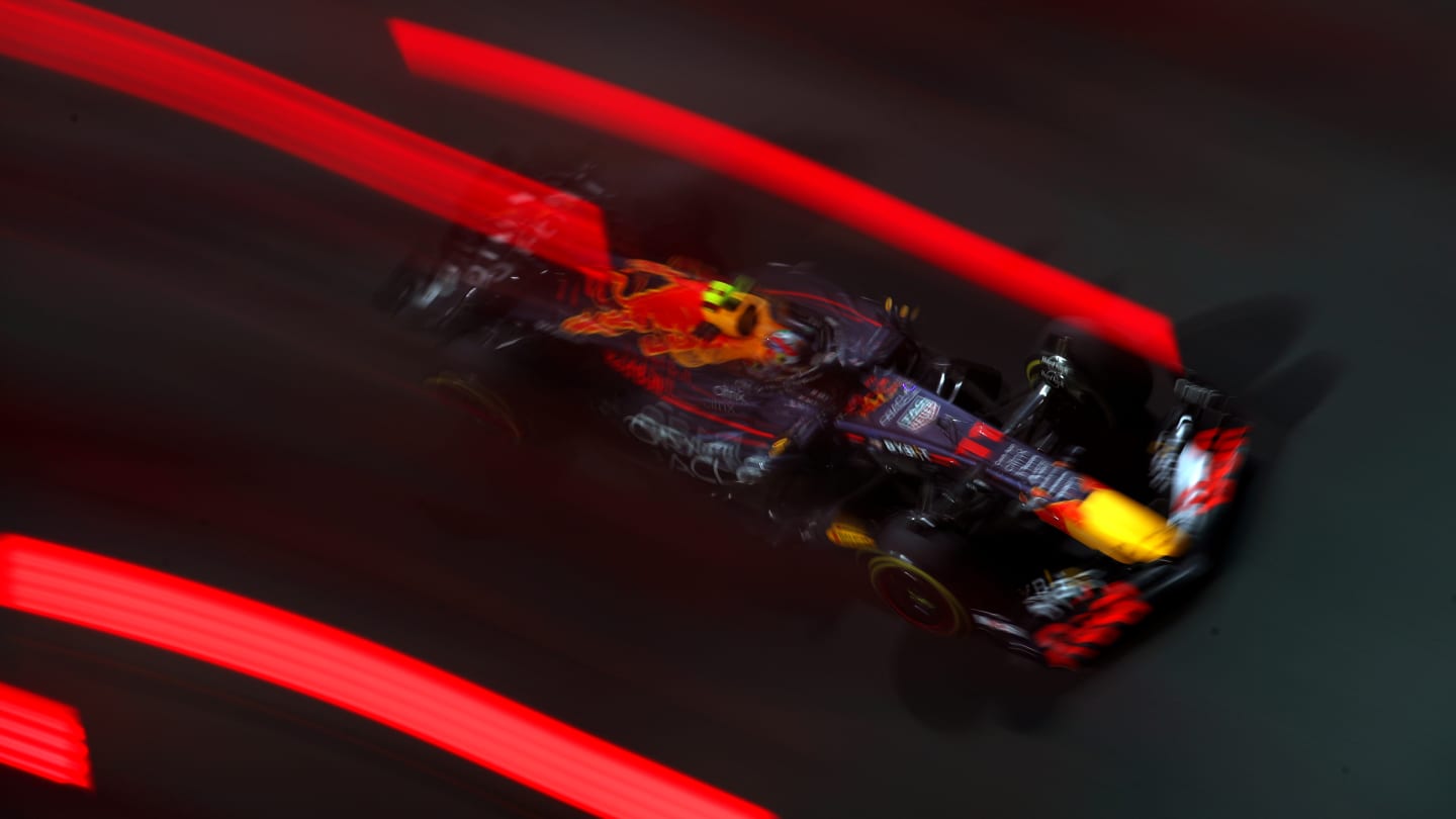 ABU DHABI, UNITED ARAB EMIRATES - NOVEMBER 18: Sergio Perez of Mexico driving the (11) Oracle Red Bull Racing RB18 on track during practice ahead of the F1 Grand Prix of Abu Dhabi at Yas Marina Circuit on November 18, 2022 in Abu Dhabi, United Arab Emirates. (Photo by Joe Portlock - Formula 1/Formula 1 via Getty Images)