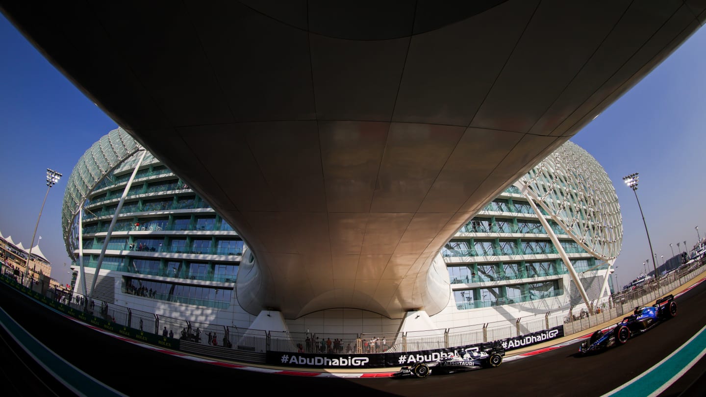 ABU DHABI, UNITED ARAB EMIRATES - NOVEMBER 19: Pierre Gasly of France driving the (10) Scuderia AlphaTauri AT03 leads Alexander Albon of Thailand driving the (23) Williams FW44 Mercedes on track during final practice ahead of the F1 Grand Prix of Abu Dhabi at Yas Marina Circuit on November 19, 2022 in Abu Dhabi, United Arab Emirates. (Photo by Bryn Lennon - Formula 1/Formula 1 via Getty Images)