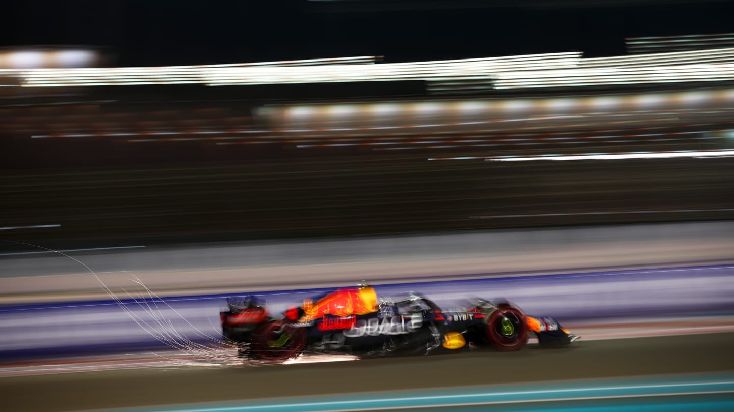 ABU DHABI, UNITED ARAB EMIRATES - NOVEMBER 19: Sparks fly behind Max Verstappen of the Netherlands