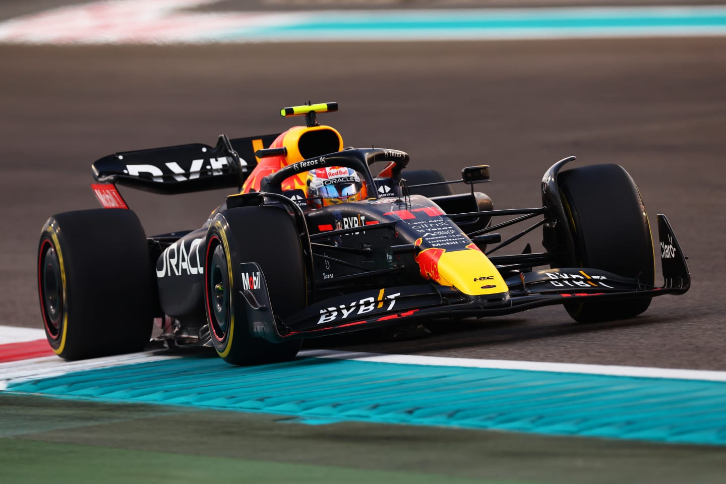 ABU DHABI, UNITED ARAB EMIRATES - NOVEMBER 20: Sergio Perez of Mexico driving the (11) Oracle Red