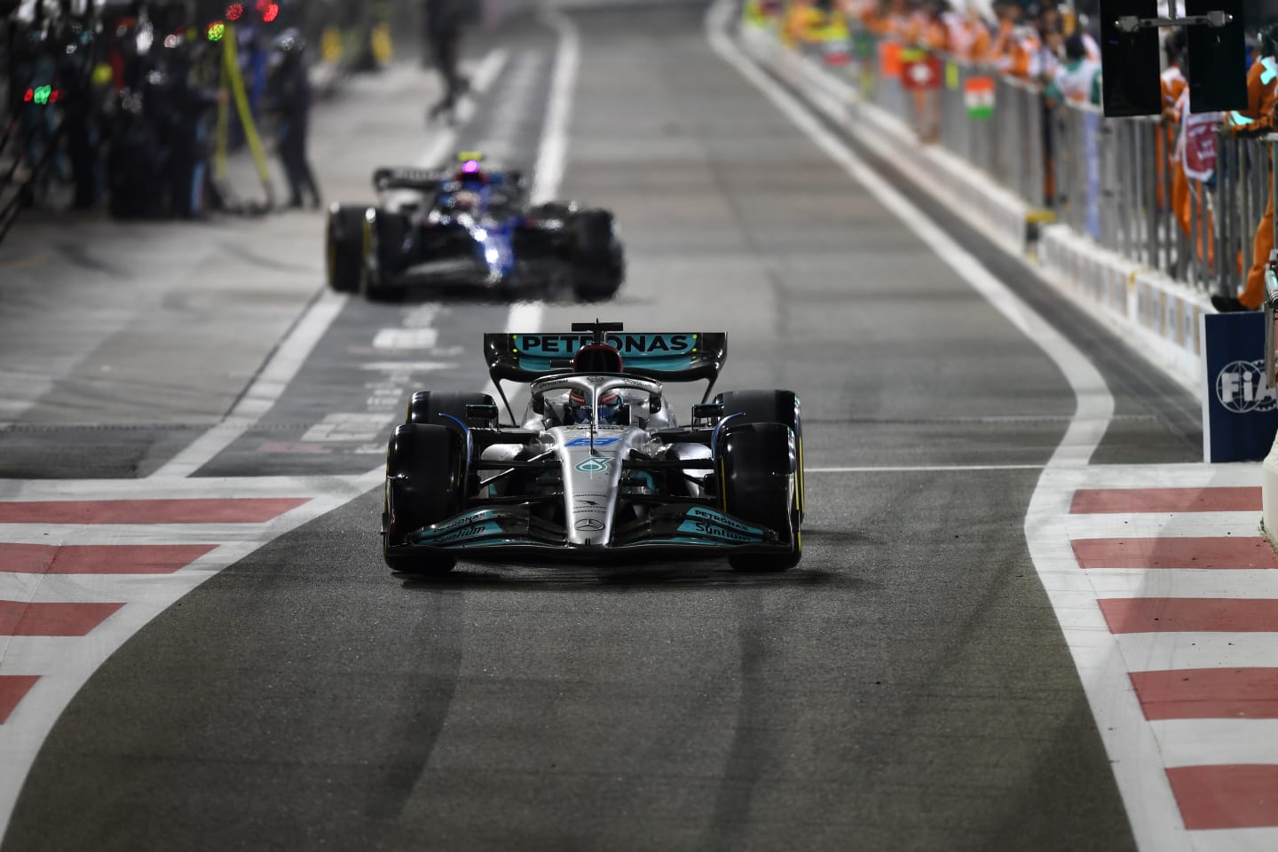 ABU DHABI, UNITED ARAB EMIRATES - NOVEMBER 20: George Russell of Great Britain driving the (63) Mercedes AMG Petronas F1 Team W13 in the pitlane during the F1 Grand Prix of Abu Dhabi at Yas Marina Circuit on November 20, 2022 in Abu Dhabi, United Arab Emirates. (Photo by Rudy Carezzevoli/Getty Images)