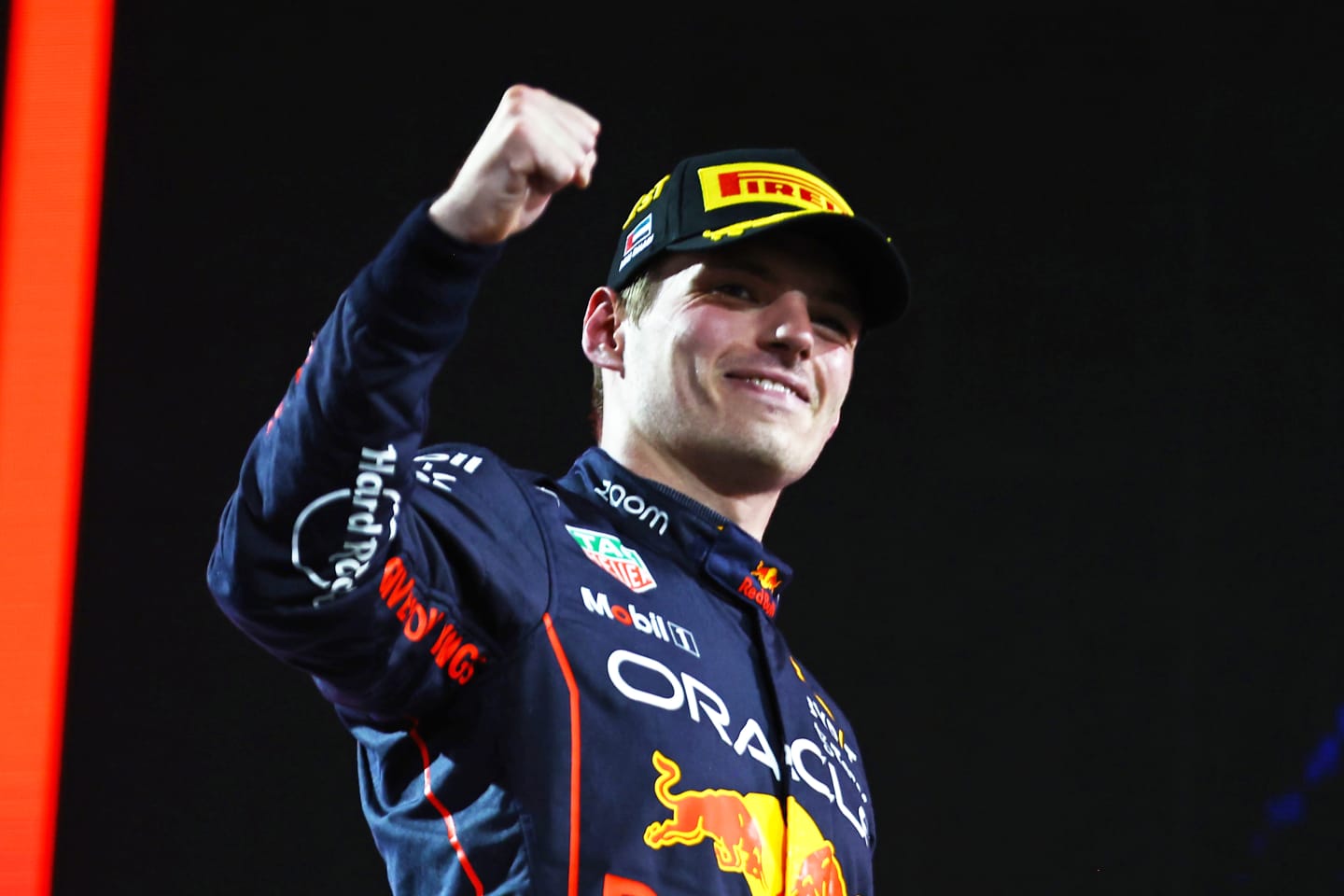 ABU DHABI, UNITED ARAB EMIRATES - NOVEMBER 20: Race winner Max Verstappen of the Netherlands and Oracle Red Bull Racing celebrates on the podium following the F1 Grand Prix of Abu Dhabi at Yas Marina Circuit on November 20, 2022 in Abu Dhabi, United Arab Emirates. (Photo by Mark Thompson/Getty Images)