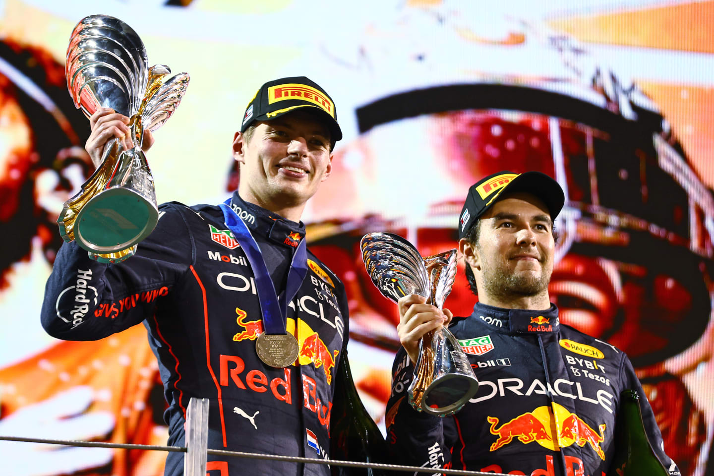 ABU DHABI, UNITED ARAB EMIRATES - NOVEMBER 20: Race Winner Max Verstappen of the Netherlands and