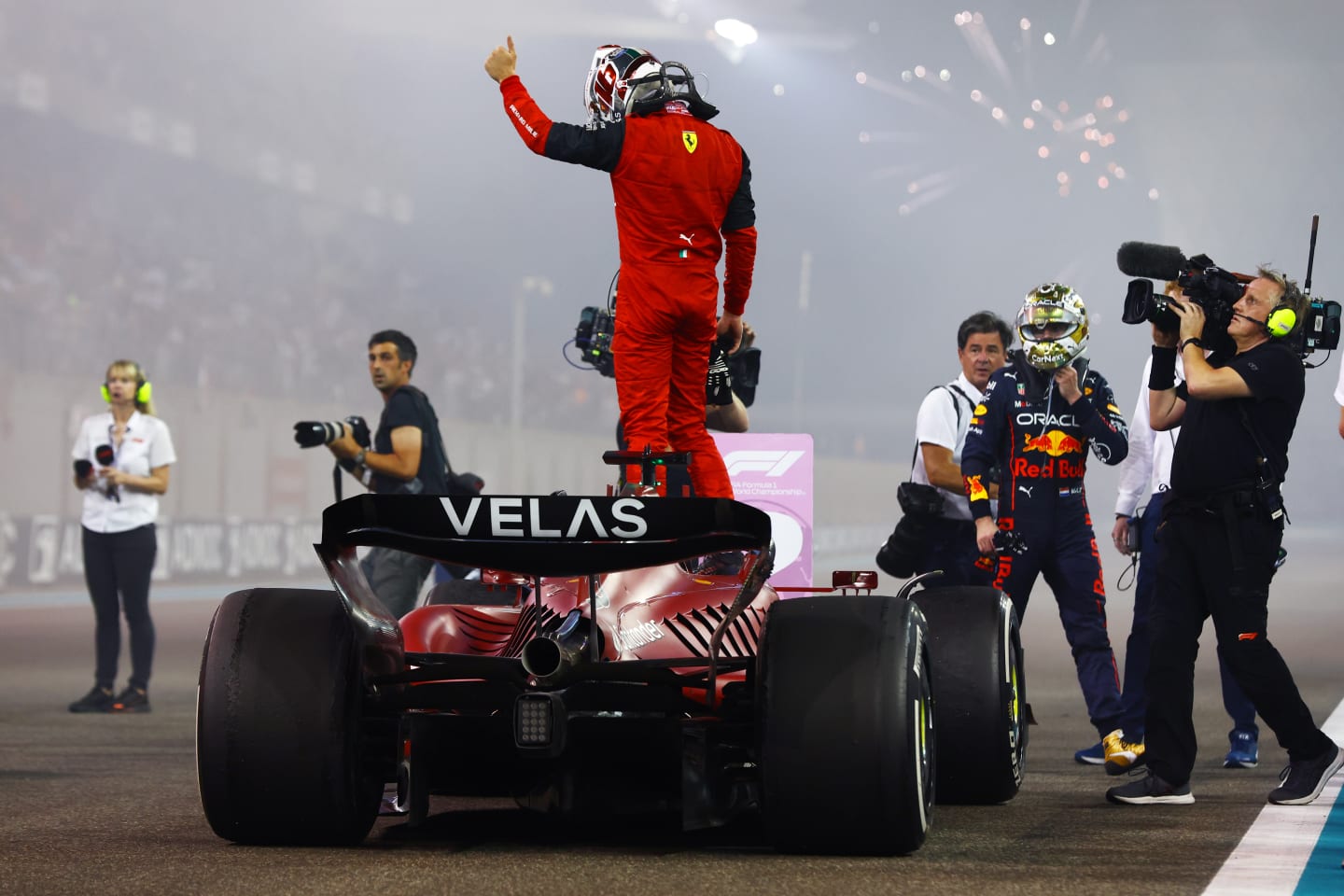 ABU DHABI, UNITED ARAB EMIRATES - NOVEMBER 20: Second placed Charles Leclerc of Monaco and Ferrari