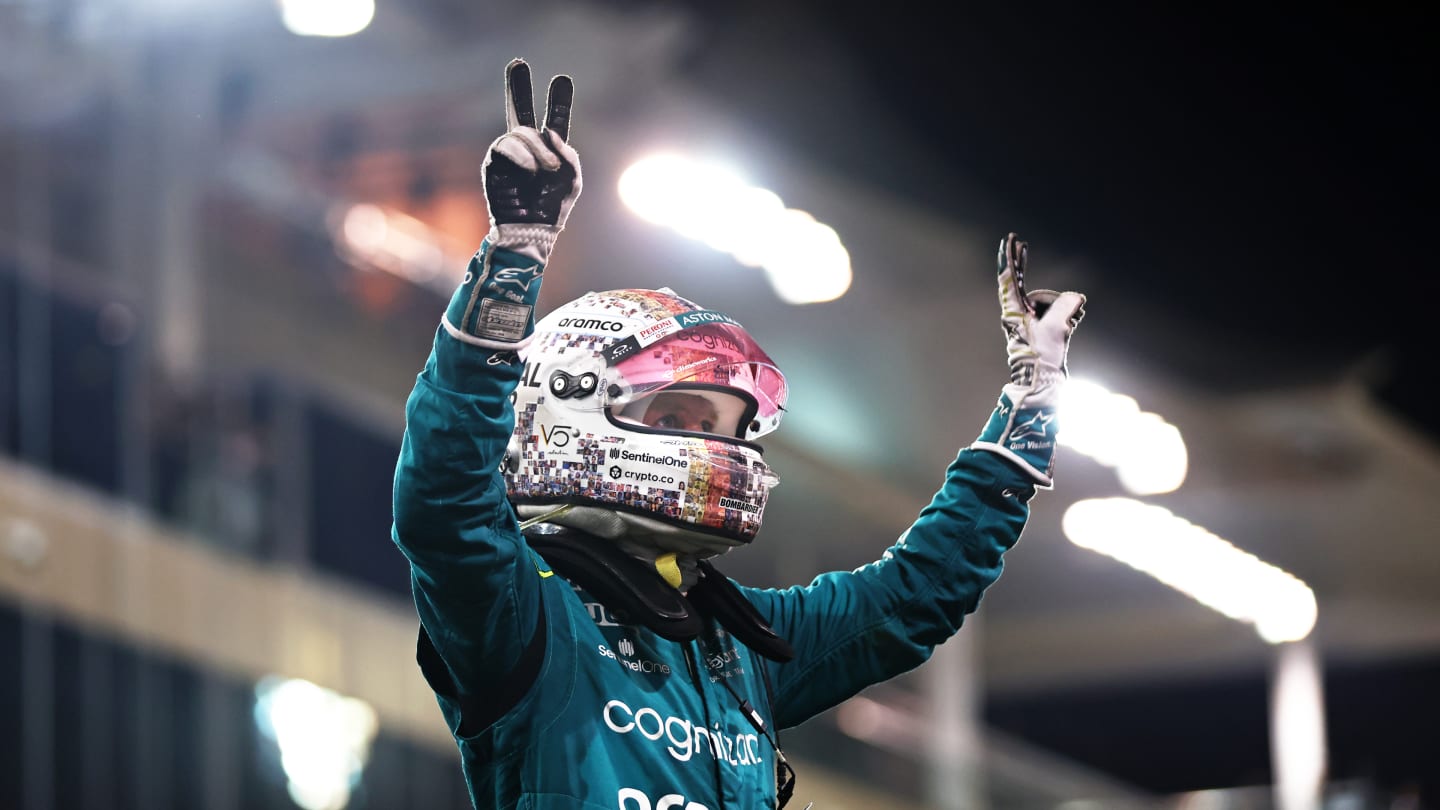 ABU DHABI, UNITED ARAB EMIRATES - NOVEMBER 20: Tenth placed Sebastian Vettel of Germany and Aston