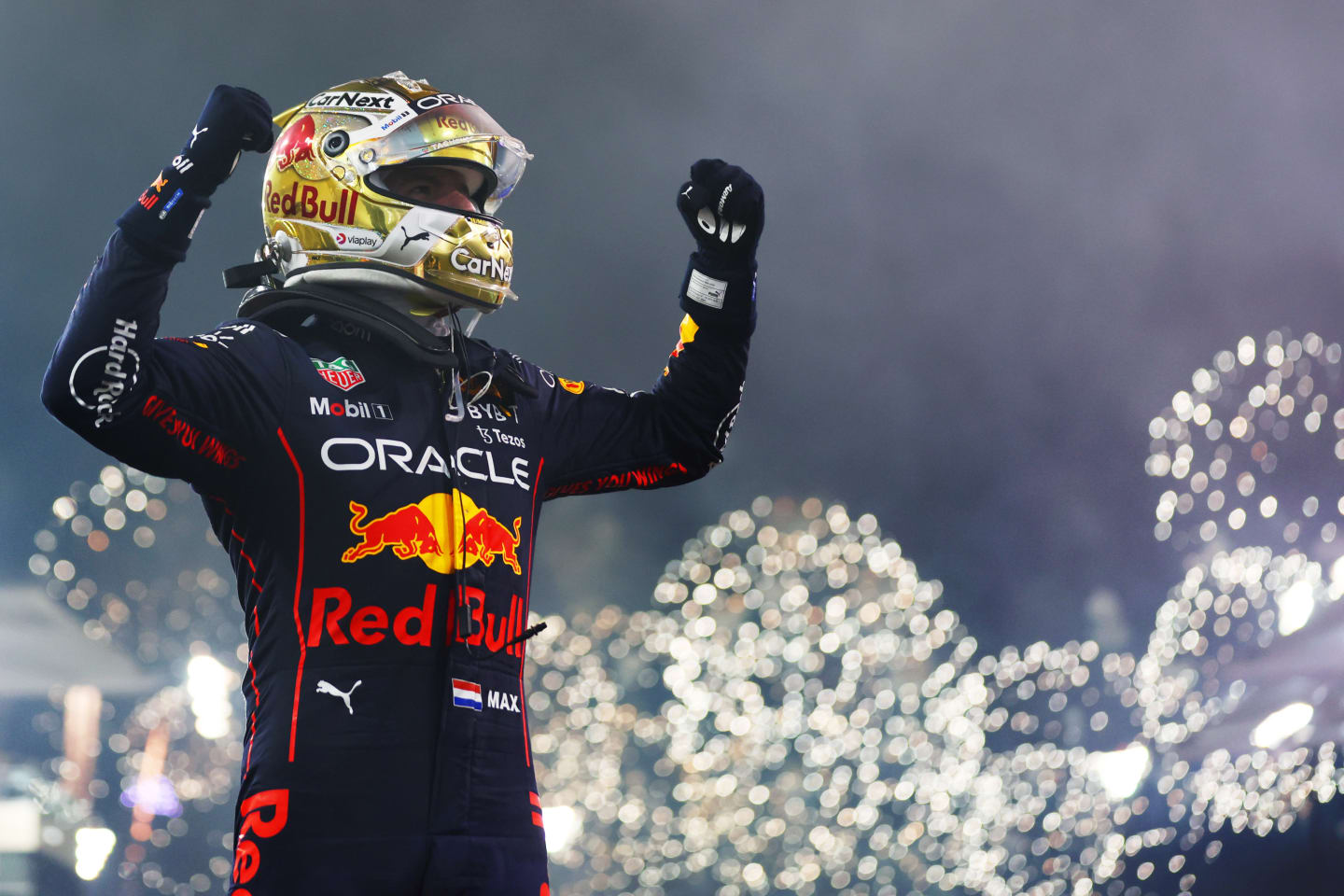 ABU DHABI, UNITED ARAB EMIRATES - NOVEMBER 20: Race winner Max Verstappen of the Netherlands and Oracle Red Bull Racing celebrates in parc ferme during the F1 Grand Prix of Abu Dhabi at Yas Marina Circuit on November 20, 2022 in Abu Dhabi, United Arab Emirates. (Photo by Dan Istitene - Formula 1/Formula 1 via Getty Images)