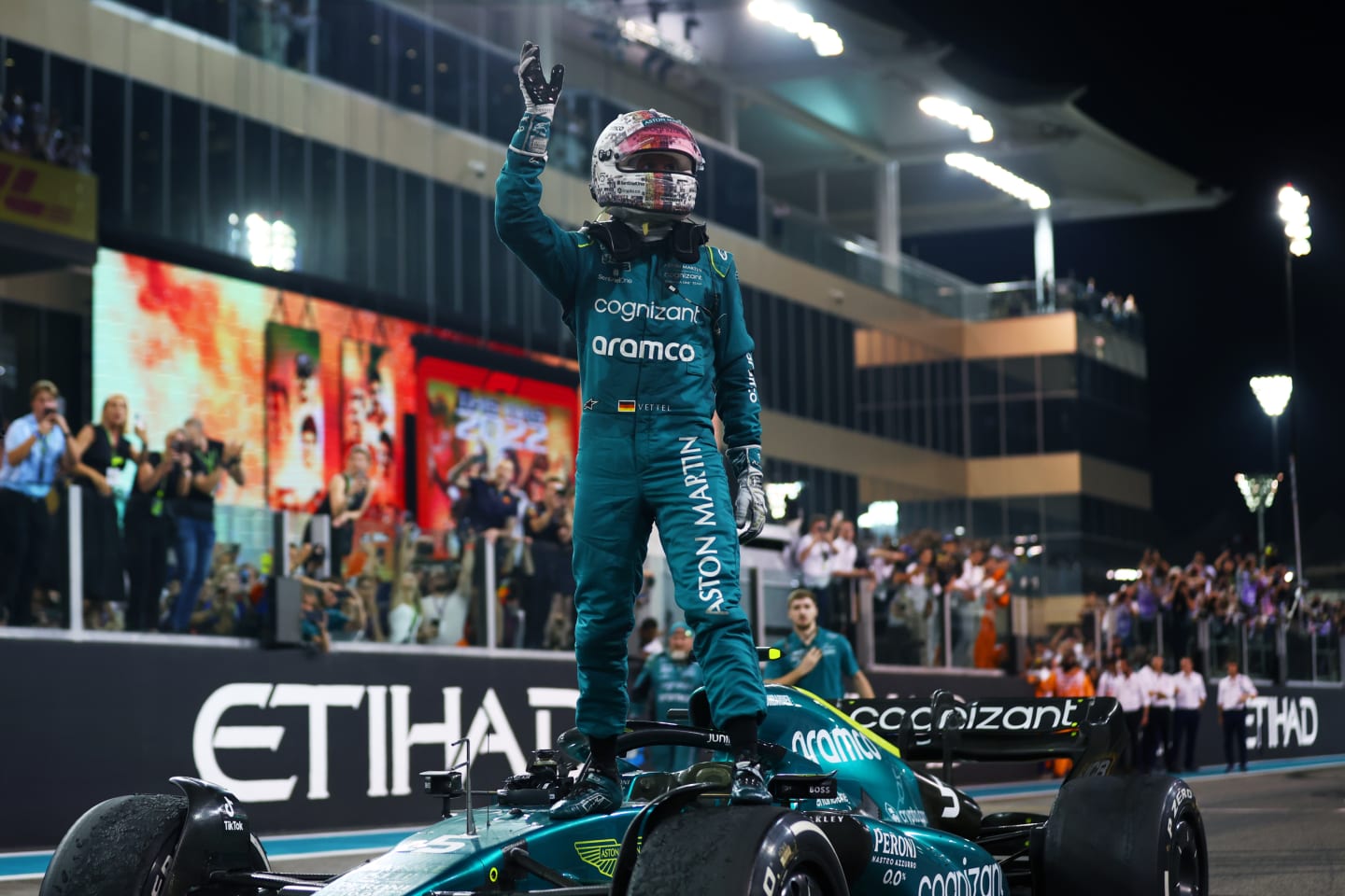ABU DHABI, UNITED ARAB EMIRATES - NOVEMBER 20: Tenth placed Sebastian Vettel of Germany and Aston