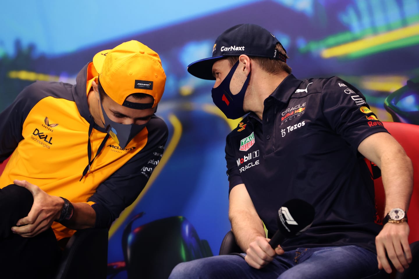 MELBOURNE, AUSTRALIA - APRIL 08: Max Verstappen of the Netherlands and Oracle Red Bull Racing talks with Lando Norris of Great Britain and McLaren in the Drivers Press Conference prior to practice ahead of the F1 Grand Prix of Australia at Melbourne Grand Prix Circuit on April 08, 2022 in Melbourne, Australia. (Photo by Robert Cianflone/Getty Images)