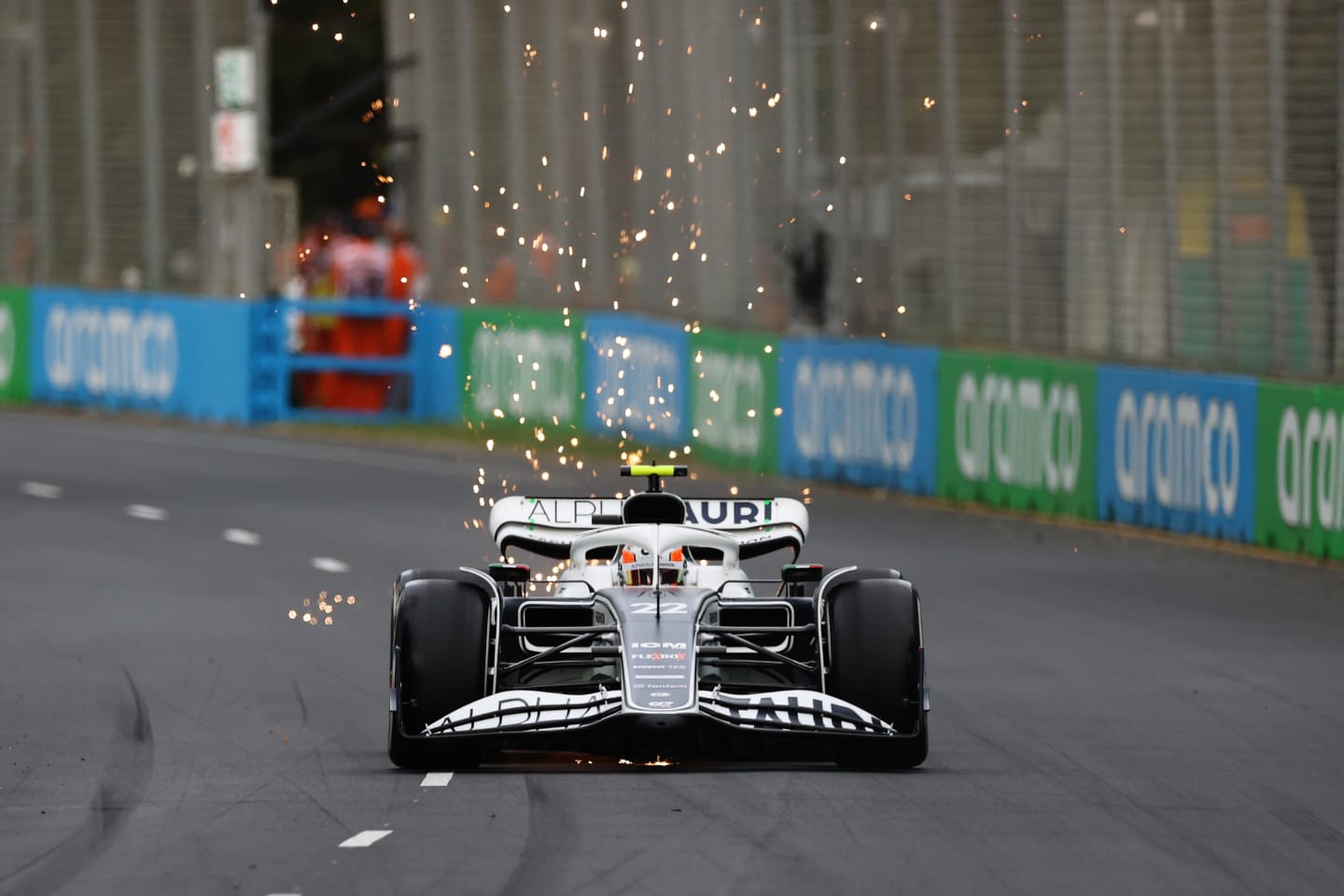 MELBOURNE, AUSTRALIA - APRIL 08: Sparks fly behind Yuki Tsunoda of Japan driving the (22) Scuderia AlphaTauri AT03 on track during practice ahead of the F1 Grand Prix of Australia at Melbourne Grand Prix Circuit on April 08, 2022 in Melbourne, Australia. (Photo by Robert Cianflone/Getty Images)