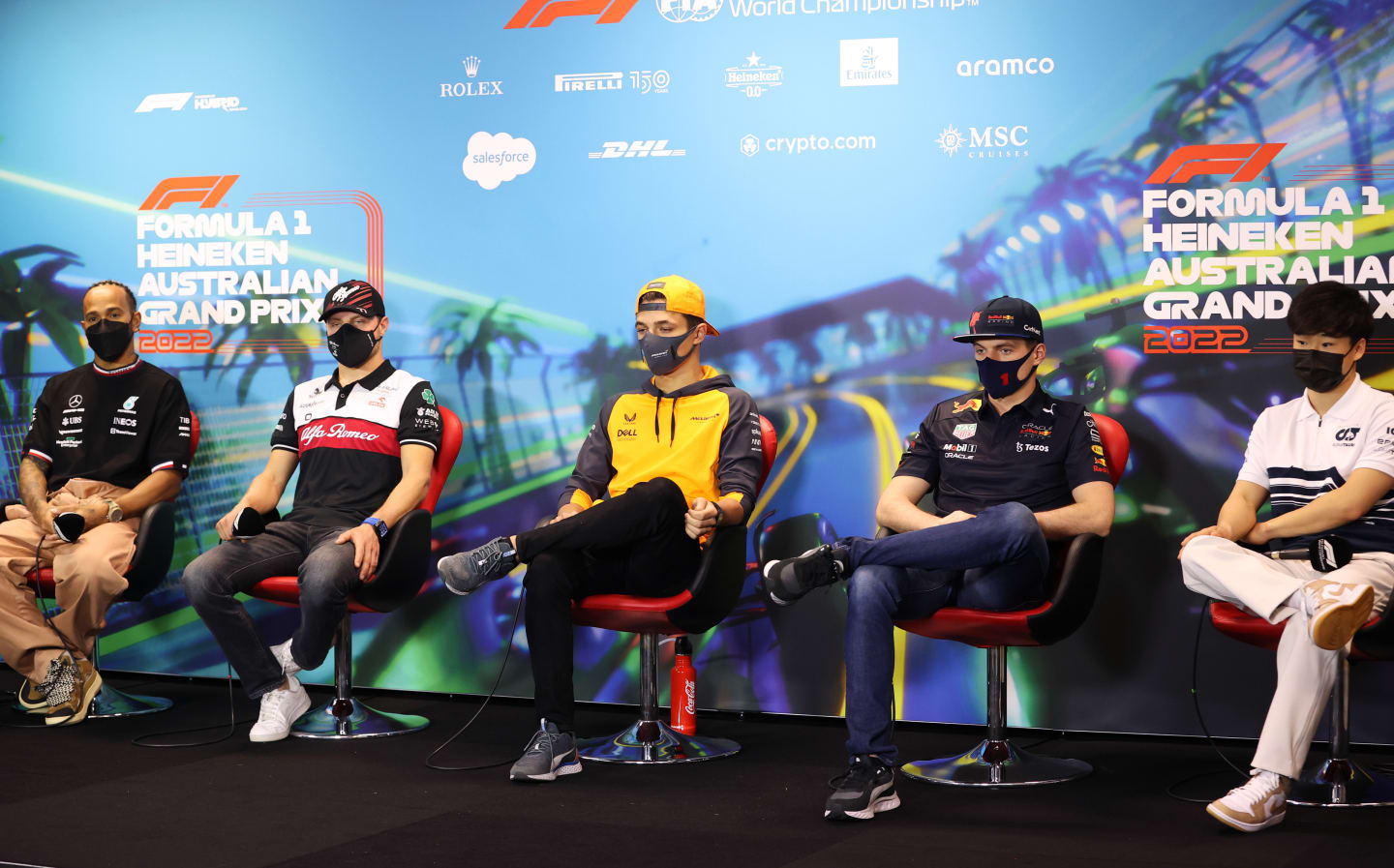 MELBOURNE, AUSTRALIA - APRIL 08: (L-R) Lewis Hamilton of Great Britain and Mercedes, Valtteri Bottas of Finland and Alfa Romeo F1, Lando Norris of Great Britain and McLaren, Max Verstappen of the Netherlands and Oracle Red Bull Racing and Yuki Tsunoda of Japan and Scuderia AlphaTauri attend the Drivers Press Conference prior to during practice ahead of the F1 Grand Prix of Australia at Melbourne Grand Prix Circuit on April 08, 2022 in Melbourne, Australia. (Photo by Robert Cianflone/Getty Images)