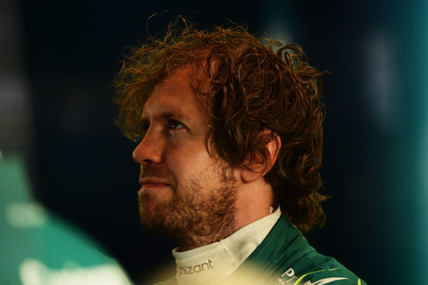 MELBOURNE, AUSTRALIA - APRIL 08: Sebastian Vettel of Germany and Aston Martin F1 Team looks on in the garage during practice ahead of the F1 Grand Prix of Australia at Melbourne Grand Prix Circuit on April 08, 2022 in Melbourne, Australia. (Photo by Mario Renzi - Formula 1/Formula 1 via Getty Images)