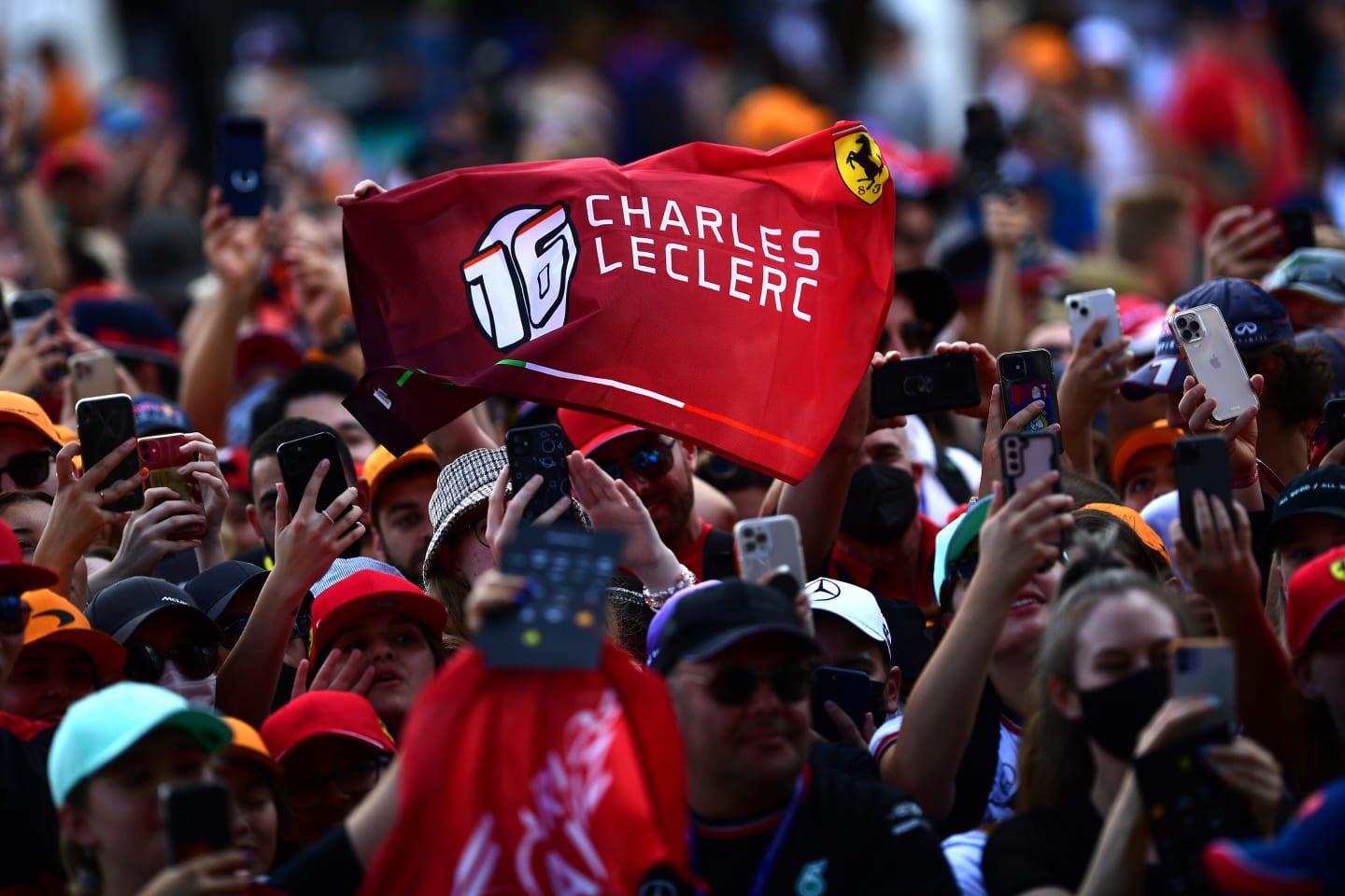 MELBOURNE, AUSTRALIA - APRIL 09: Charles Leclerc of Monaco and Ferrari fans hold a banner to show