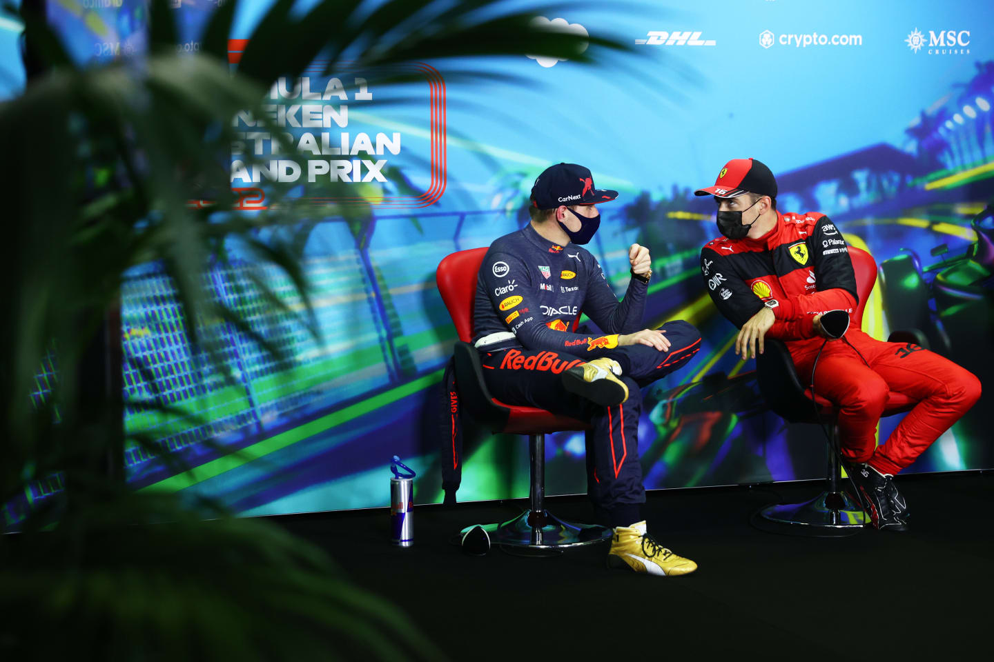 MELBOURNE, AUSTRALIA - APRIL 09: Pole position qualifier Charles Leclerc of Monaco and Ferrari and Second placed qualifier Max Verstappen of the Netherlands and Oracle Red Bull Racing talk in the press conference after qualifying ahead of the F1 Grand Prix of Australia at Melbourne Grand Prix Circuit on April 09, 2022 in Melbourne, Australia. (Photo by Dan Istitene - Formula 1/Formula 1 via Getty Images)