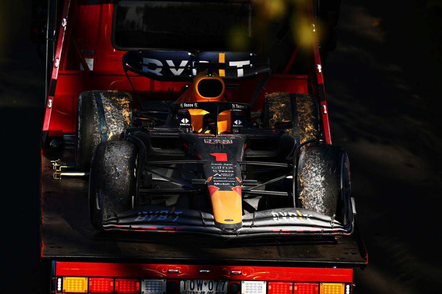 MELBOURNE, AUSTRALIA - APRIL 10: The car of Max Verstappen of the Netherlands and Oracle Red Bull Racing is recovered to the garage after he retired from the race during the F1 Grand Prix of Australia at Melbourne Grand Prix Circuit on April 10, 2022 in Melbourne, Australia. (Photo by Clive Mason/Getty Images)