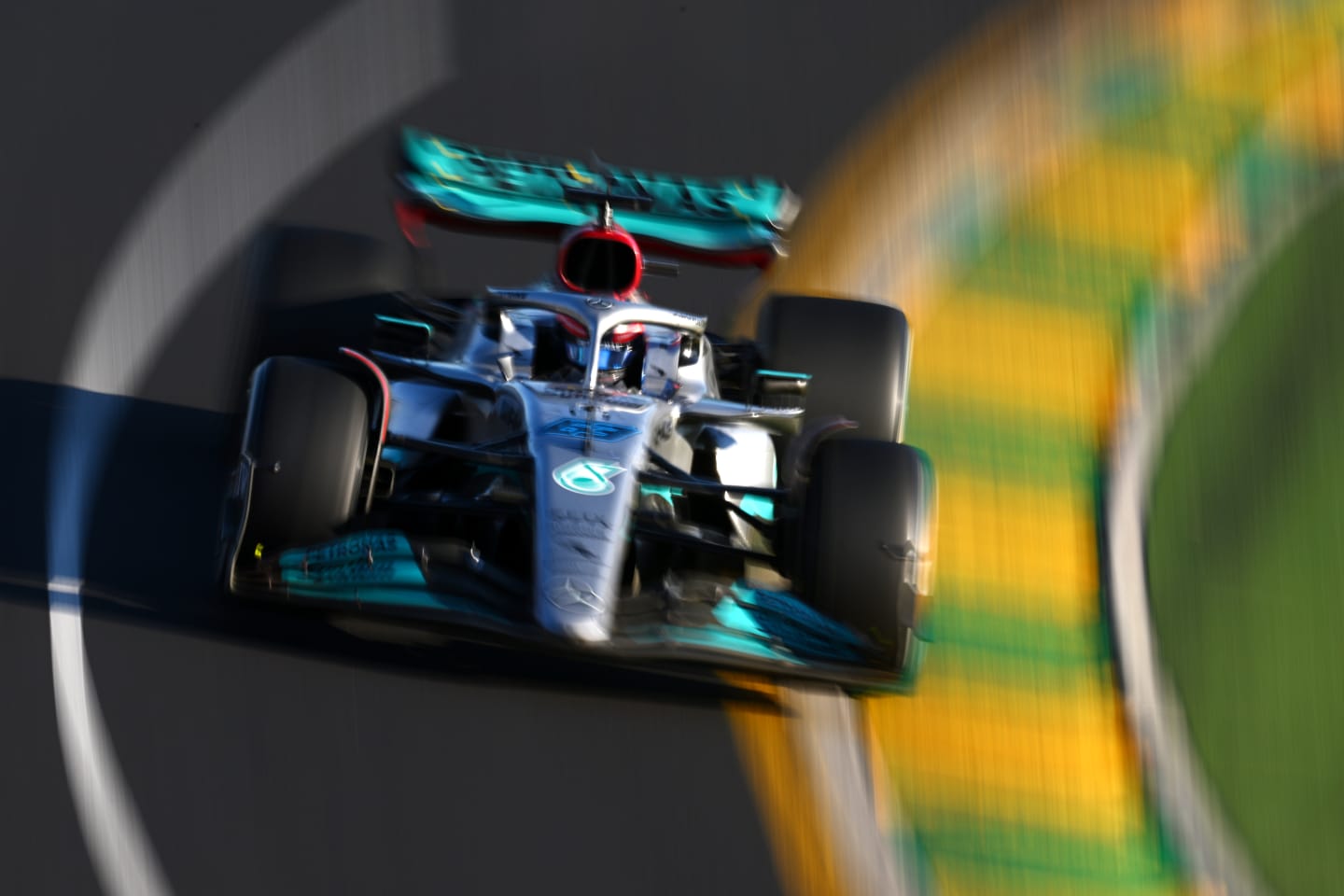 MELBOURNE, AUSTRALIA - APRIL 10: George Russell of Great Britain driving the (63) Mercedes AMG Petronas F1 Team W13 on track during the F1 Grand Prix of Australia at Melbourne Grand Prix Circuit on April 10, 2022 in Melbourne, Australia. (Photo by Clive Mason/Getty Images)