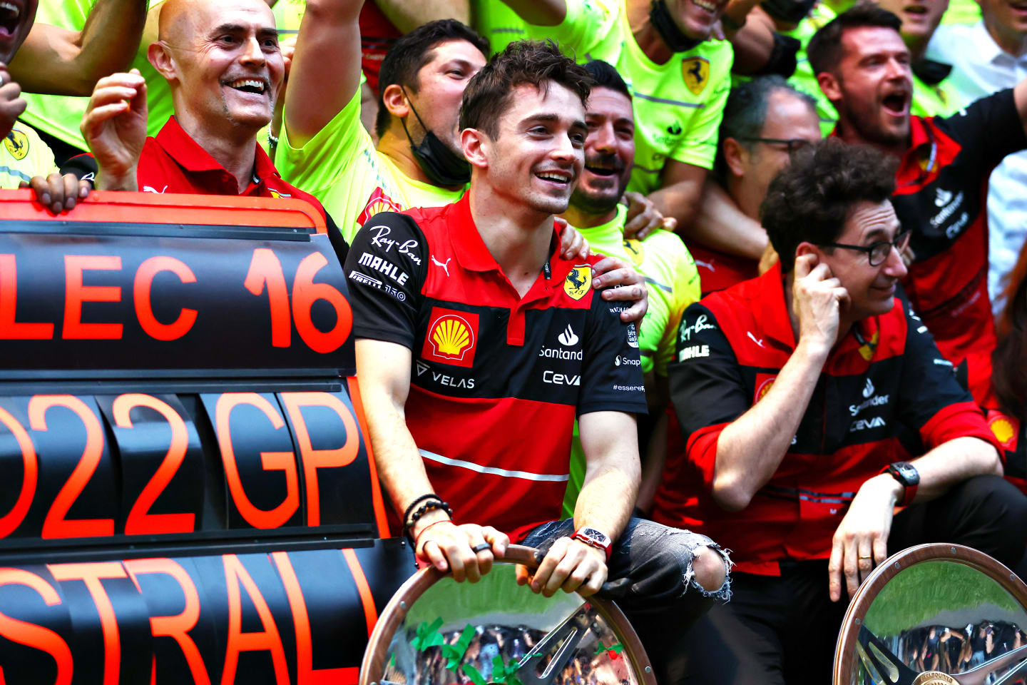 MELBOURNE, AUSTRALIA - APRIL 10: Race winner Charles Leclerc of Monaco and Ferrari celebrates with his team after the F1 Grand Prix of Australia at Melbourne Grand Prix Circuit on April 10, 2022 in Melbourne, Australia. (Photo by Bryn Lennon - Formula 1/Formula 1 via Getty Images)