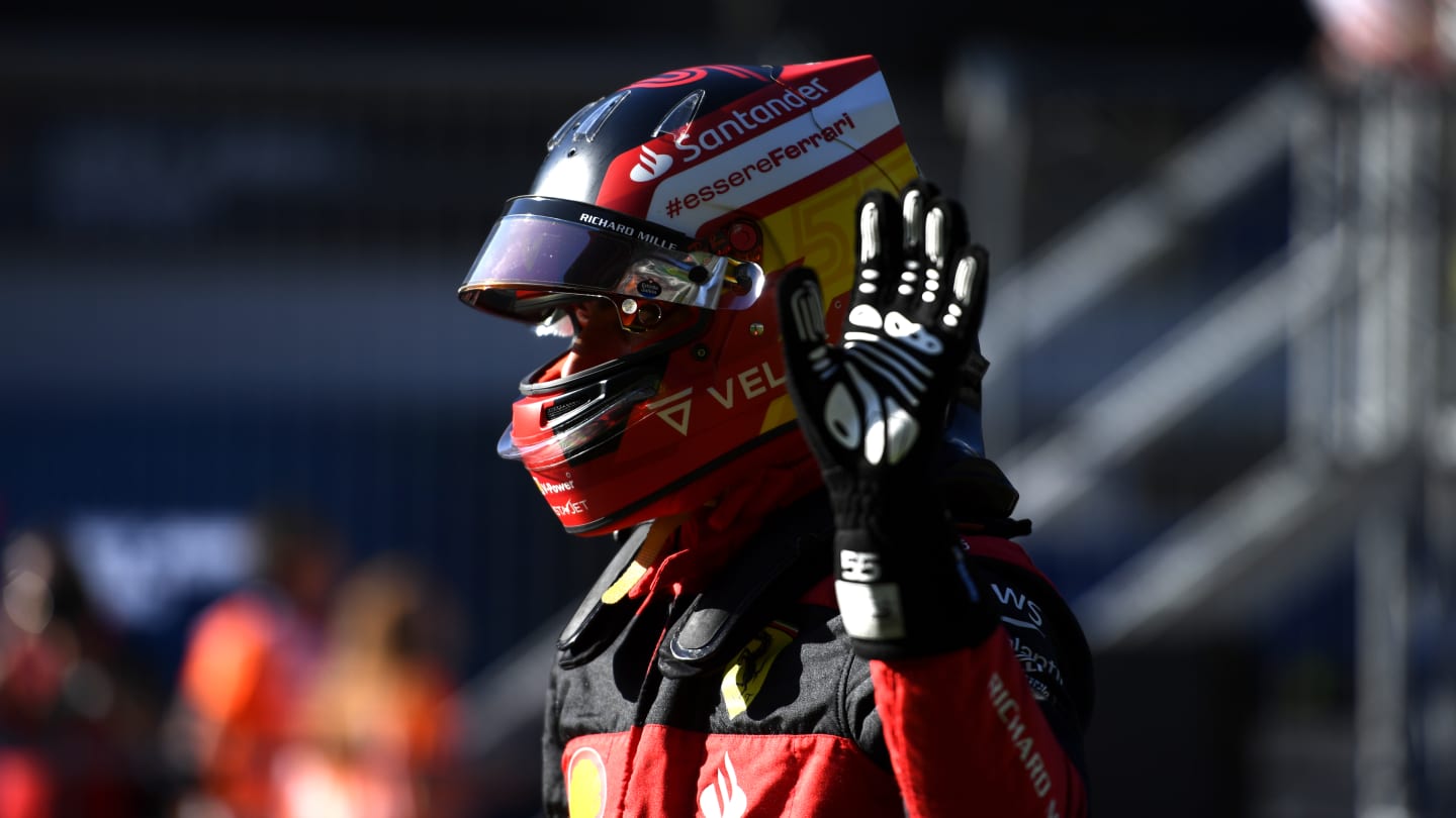 SPIELBERG, AUSTRIA - JULY 08: Third placed qualifier Carlos Sainz of Spain and Ferrari waves in parc ferme during qualifying ahead of the F1 Grand Prix of Austria at Red Bull Ring on July 08, 2022 in Spielberg, Austria. (Photo by Rudy Carezzevoli - Formula 1/Formula 1 via Getty Images)