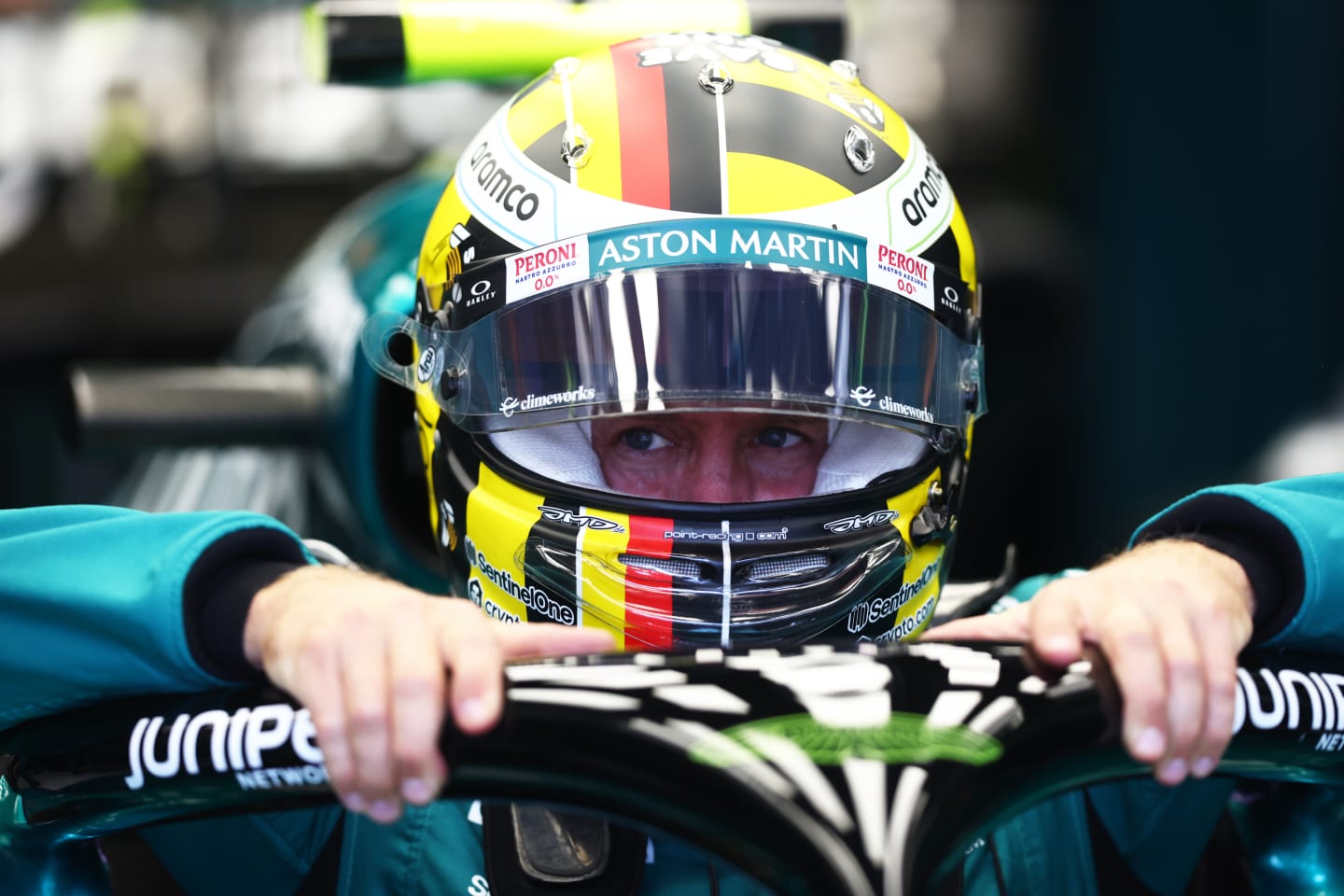 SPIELBERG, AUSTRIA - JULY 09: Sebastian Vettel of Germany and Aston Martin F1 Team prepares to