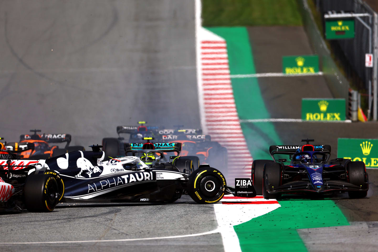 SPIELBERG, AUSTRIA - JULY 09: Pierre Gasly of France driving the (10) Scuderia AlphaTauri AT03 spins at the start during the F1 Grand Prix of Austria Sprint at Red Bull Ring on July 09, 2022 in Spielberg, Austria. (Photo by Bryn Lennon/Getty Images)