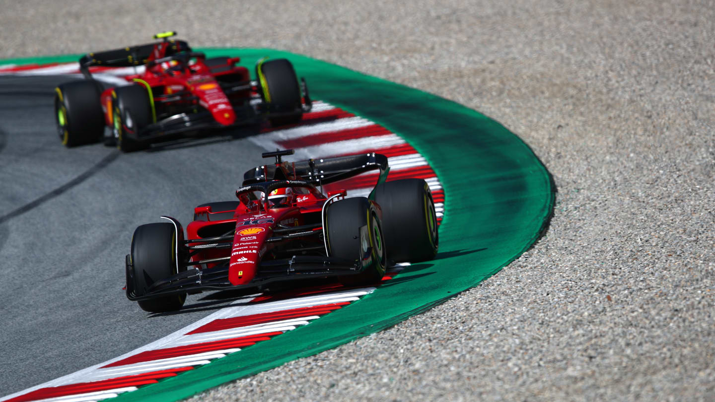 SPIELBERG, AUSTRIA - JULY 09: Charles Leclerc of Monaco driving the (16) Ferrari F1-75 leads Carlos