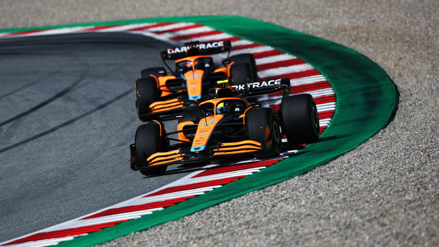 SPIELBERG, AUSTRIA - JULY 09: Lando Norris of Great Britain driving the (4) McLaren MCL36 Mercedes leads Daniel Ricciardo of Australia driving the (3) McLaren MCL36 Mercedes during the F1 Grand Prix of Austria Sprint at Red Bull Ring on July 09, 2022 in Spielberg, Austria. (Photo by Joe Portlock - Formula 1/Formula 1 via Getty Images)