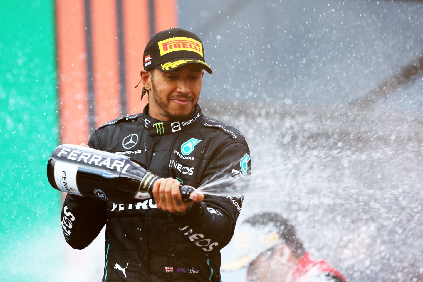 SPIELBERG, AUSTRIA - JULY 10: Third placed Lewis Hamilton of Great Britain and Mercedes celebrates