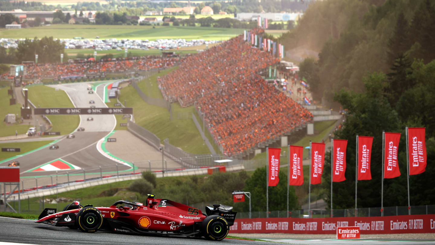 SPIELBERG, AUSTRIA - JULY 10: Carlos Sainz of Spain driving (55) the Ferrari F1-75 on track during