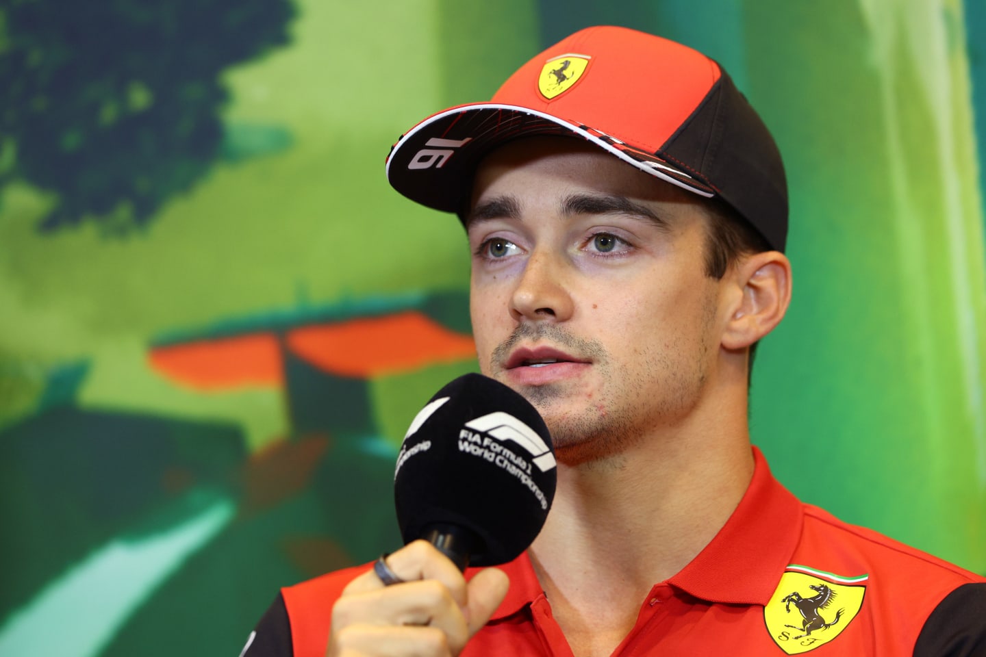 BAKU, AZERBAIJAN - JUNE 10: Charles Leclerc of Monaco and Ferrari talks in the Drivers Press Conference prior to practice ahead of the F1 Grand Prix of Azerbaijan at Baku City Circuit on June 10, 2022 in Baku, Azerbaijan. (Photo by Clive Rose/Getty Images)