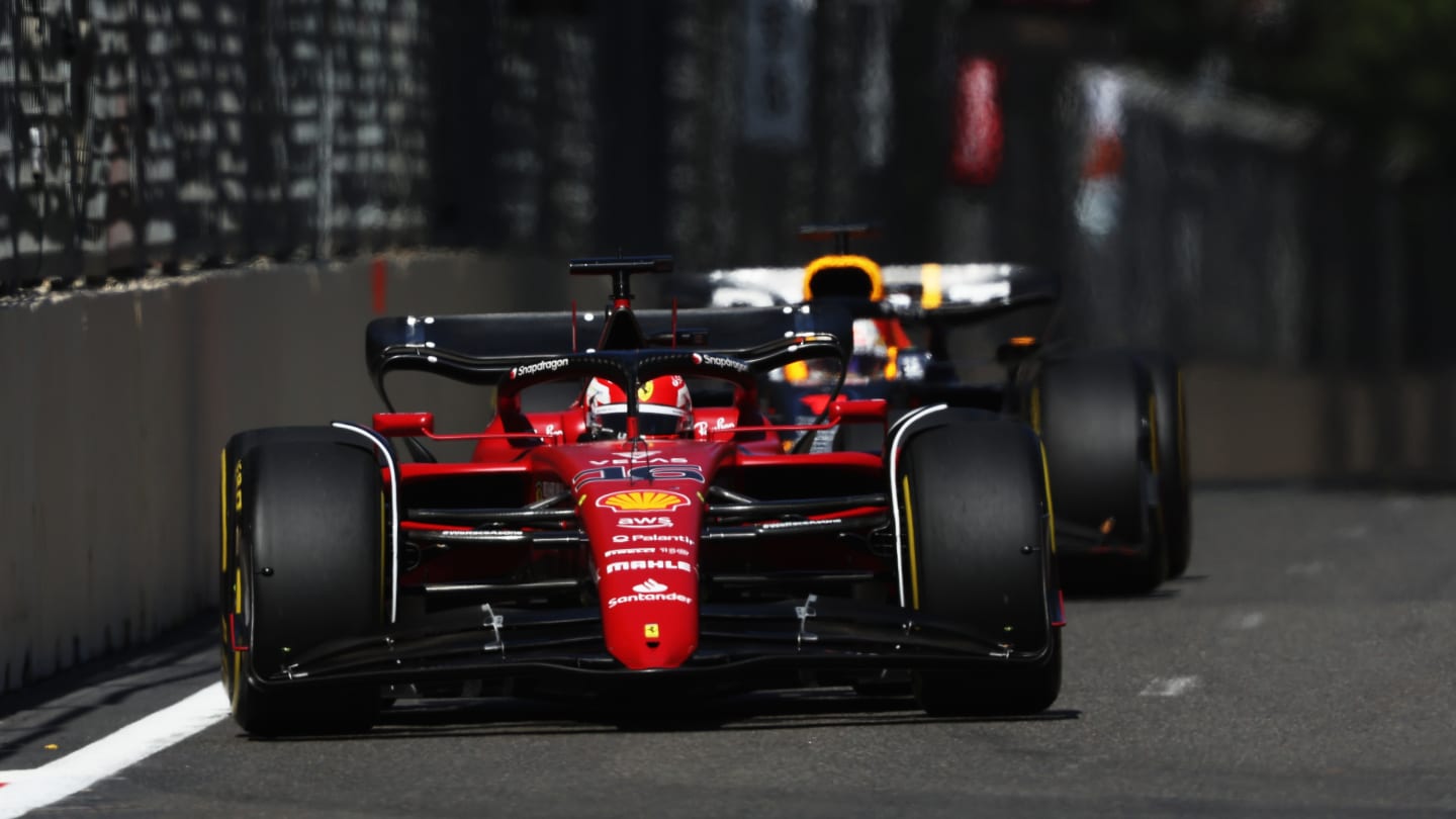 BAKU, AZERBAIJAN - JUNE 12: Charles Leclerc of Monaco driving the (16) Ferrari F1-75 leads Max