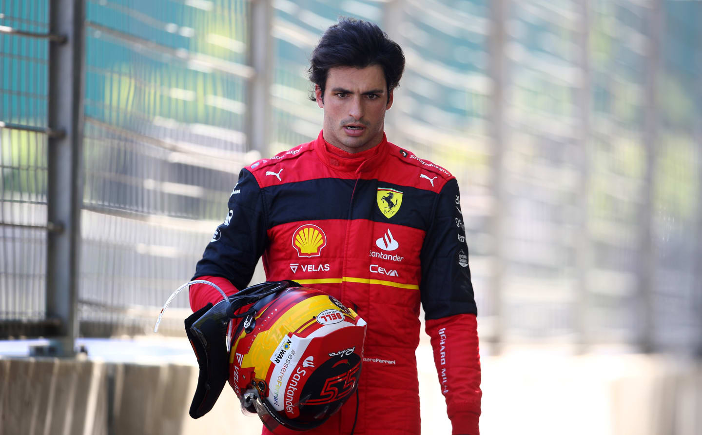 BAKU, AZERBAIJAN - JUNE 12: Carlos Sainz of Spain and Ferrari looks dejected after retiring from