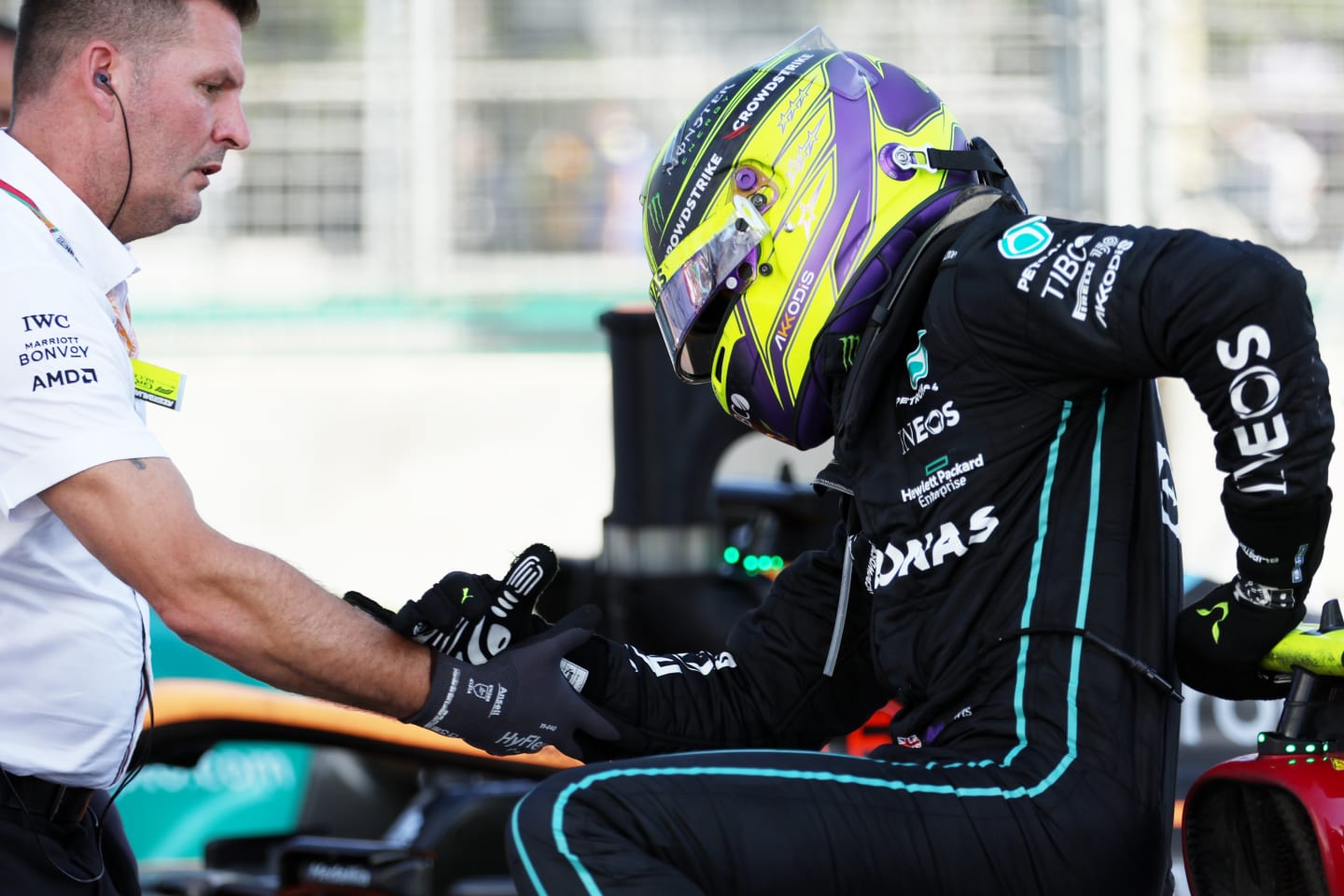 BAKU, AZERBAIJAN - JUNE 12: Fourth placed Lewis Hamilton of Great Britain and Mercedes is assisted from his car after complaining of pain during the F1 Grand Prix of Azerbaijan at Baku City Circuit on June 12, 2022 in Baku, Azerbaijan. (Photo by Bryn Lennon - Formula 1/Formula 1 via Getty Images)