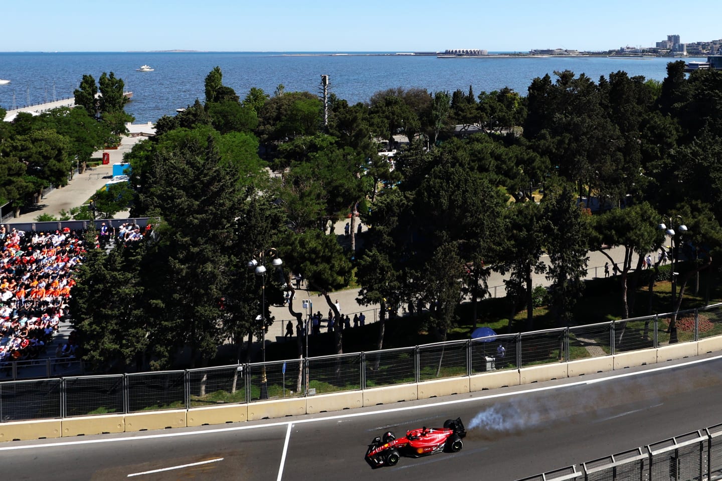 BAKU, AZERBAIJAN - JUNE 12: Smoke pours from the car of Charles Leclerc of Monaco driving the (16)