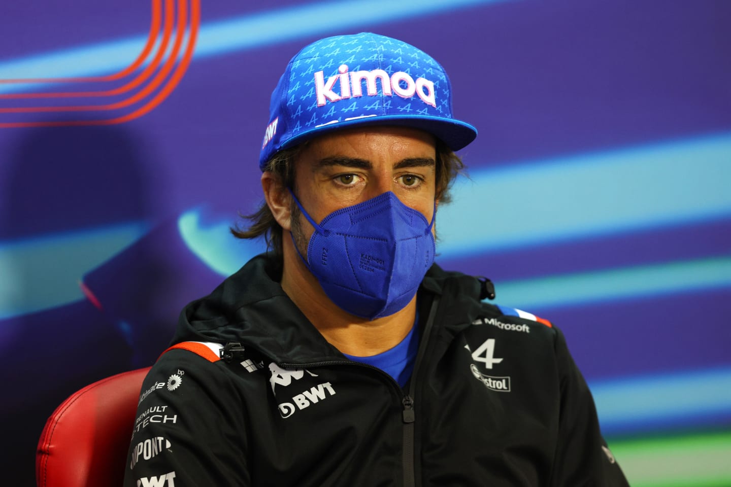 BAHRAIN, BAHRAIN - MARCH 18: Fernando Alonso of Spain and Alpine F1 talks in the Drivers Press Conference before practice ahead of the F1 Grand Prix of Bahrain at Bahrain International Circuit on March 18, 2022 in Bahrain, Bahrain. (Photo by Lars Baron/Getty Images)