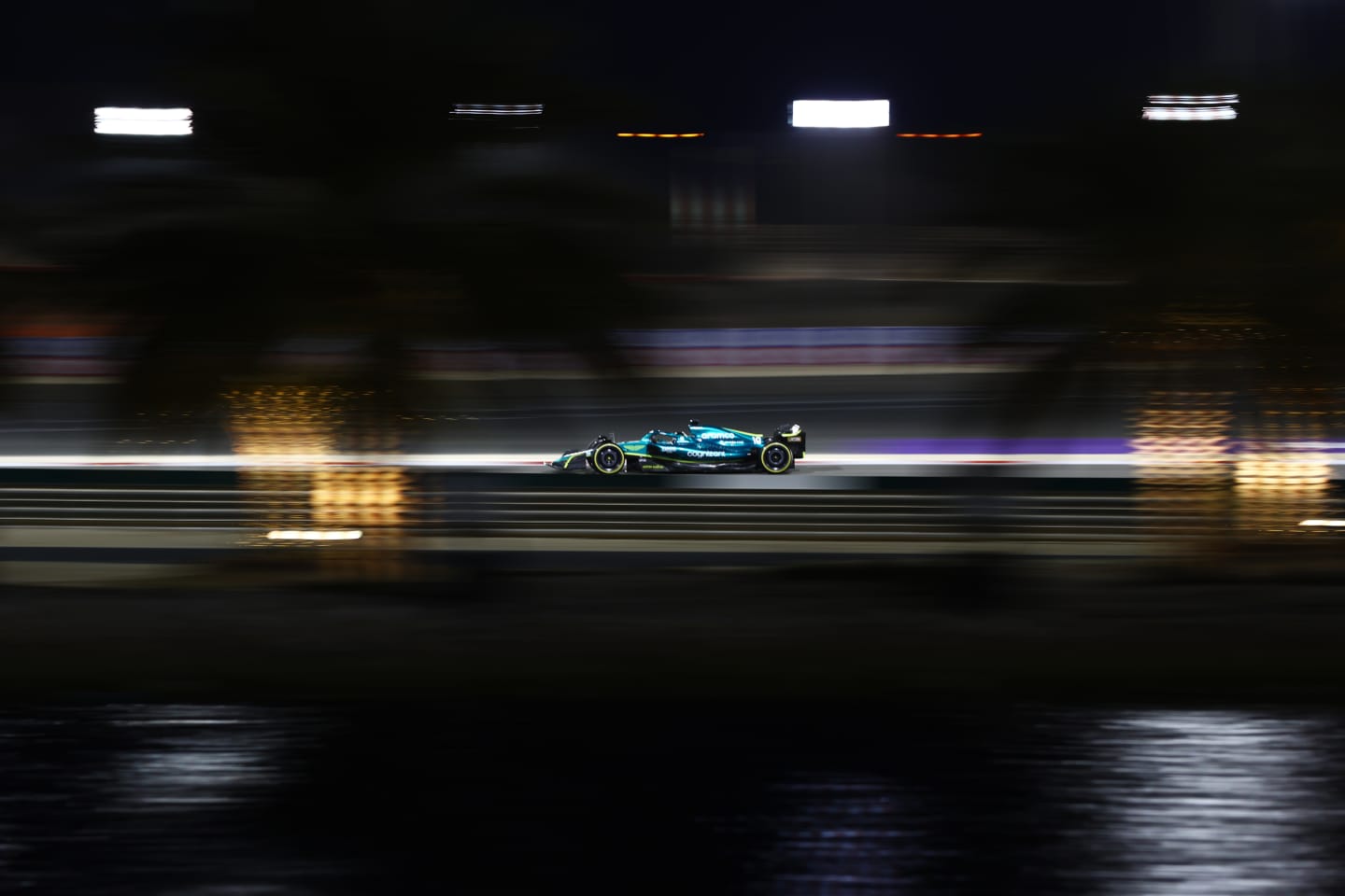 BAHRAIN, BAHRAIN - MARCH 18: Lance Stroll of Canada driving the (18) Aston Martin AMR22 Mercedes on track during practice ahead of the F1 Grand Prix of Bahrain at Bahrain International Circuit on March 18, 2022 in Bahrain, Bahrain. (Photo by Dan Istitene - Formula 1/Formula 1 via Getty Images)