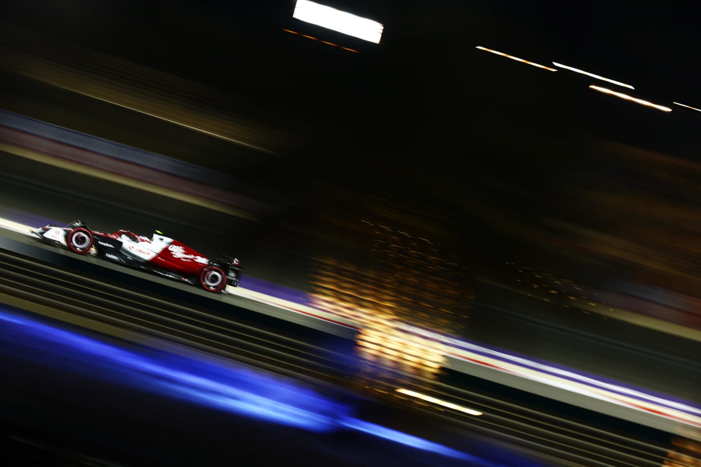 BAHRAIN, BAHRAIN - MARCH 18: Zhou Guanyu of China driving the (24) Alfa Romeo F1 C42 Ferrari on track during practice ahead of the F1 Grand Prix of Bahrain at Bahrain International Circuit on March 18, 2022 in Bahrain, Bahrain. (Photo by Mark Thompson/Getty Images)