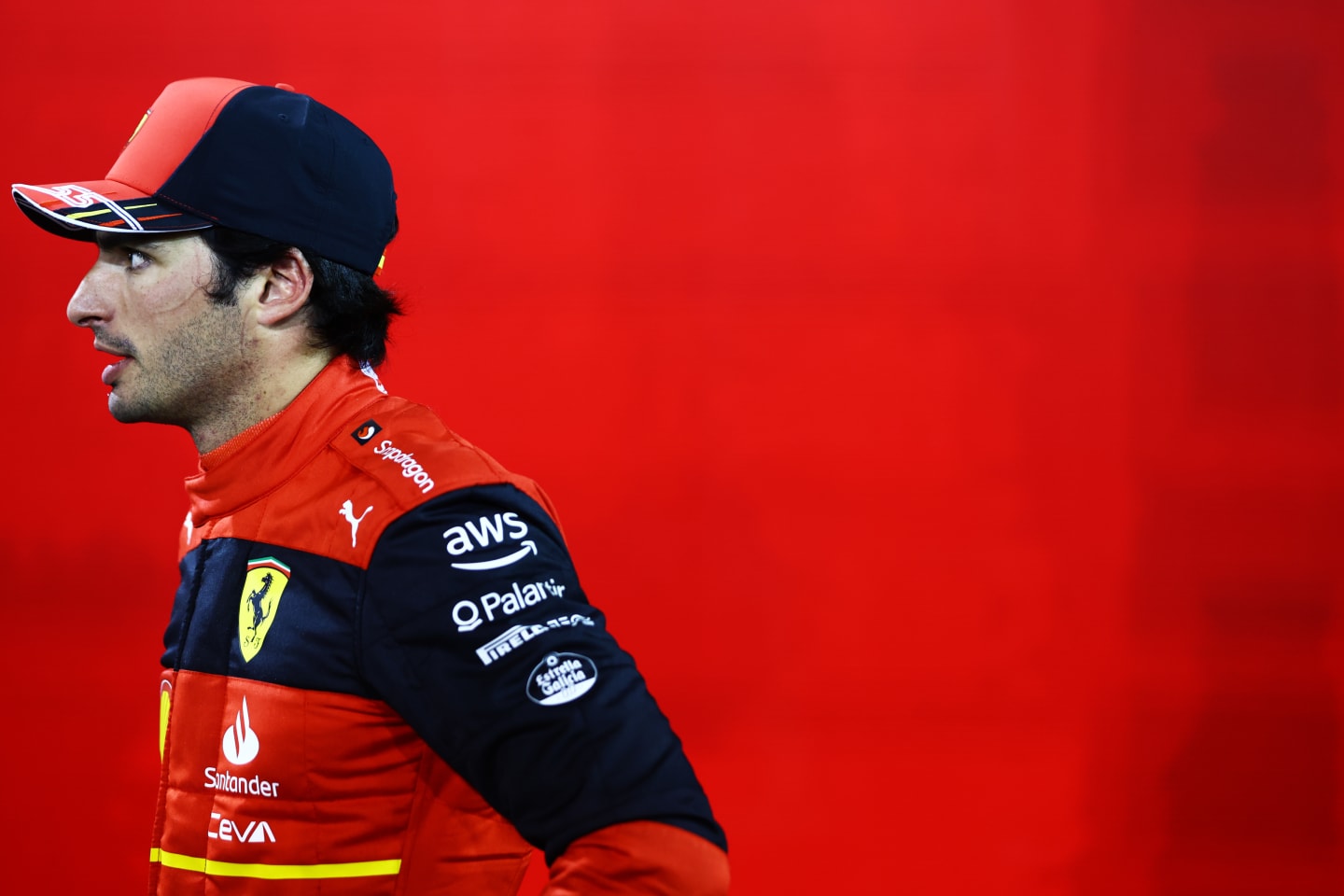 BAHRAIN, BAHRAIN - MARCH 19: Third place qualifier Carlos Sainz of Spain and Ferrari looks on in