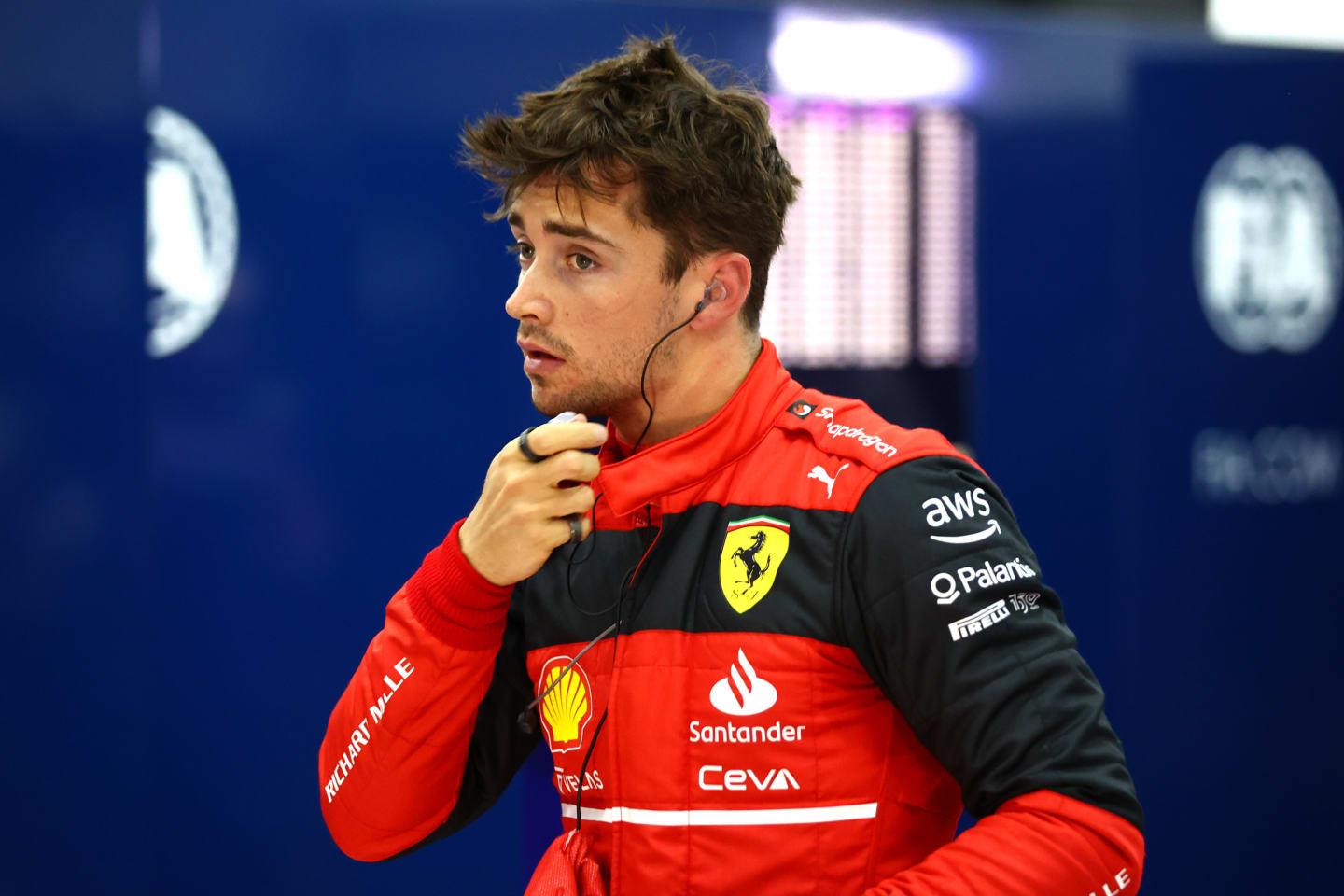 BAHRAIN, BAHRAIN - MARCH 19: Pole position qualifier Charles Leclerc of Monaco and Ferrari looks on