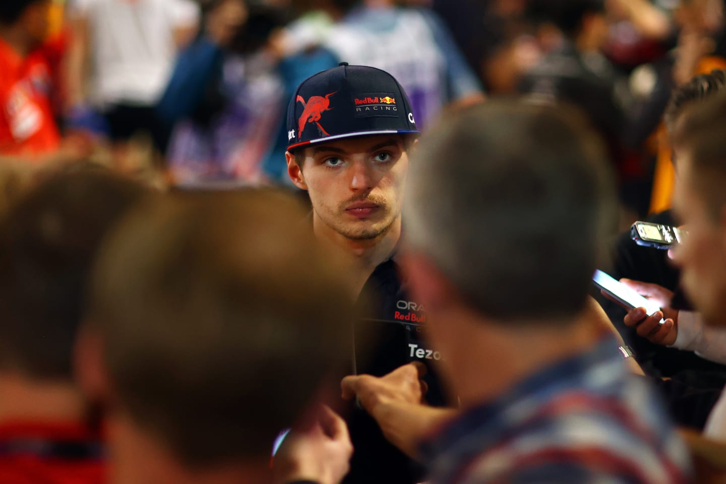 BAHRAIN, BAHRAIN - MARCH 20: Max Verstappen of the Netherlands and Oracle Red Bull Racing talks to the media in the Paddock after the F1 Grand Prix of Bahrain at Bahrain International Circuit on March 20, 2022 in Bahrain, Bahrain. (Photo by Dan Istitene - Formula 1/Formula 1 via Getty Images)
