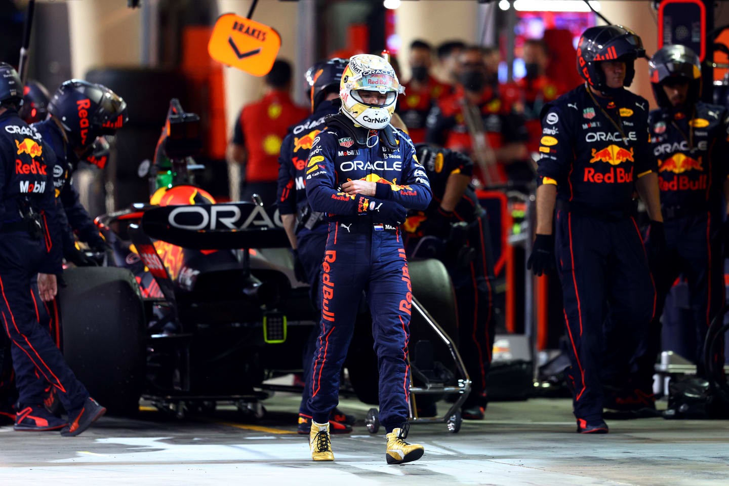 BAHRAIN, BAHRAIN - MARCH 20: Max Verstappen of the Netherlands and Oracle Red Bull Racing looks dejected as he walks from his car after retiring from the race during the F1 Grand Prix of Bahrain at Bahrain International Circuit on March 20, 2022 in Bahrain, Bahrain. (Photo by Clive Rose - Formula 1/Formula 1 via Getty Images)