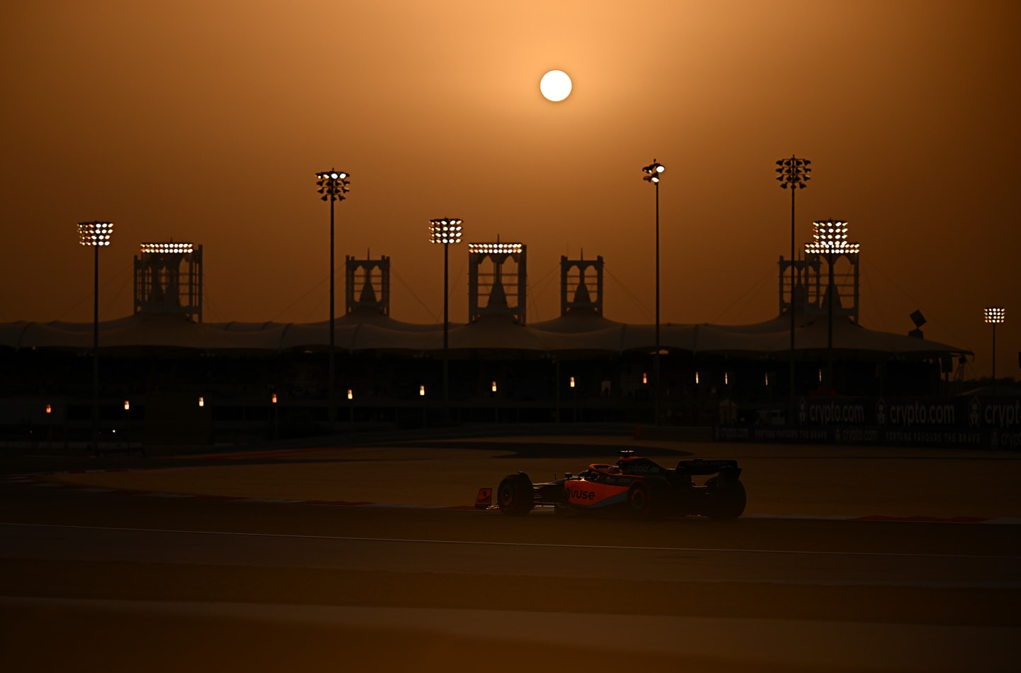 BAHRAIN, BAHRAIN - MARCH 20: Daniel Ricciardo of Australia driving the (3) McLaren MCL36 Mercedes on his way to the grid before the F1 Grand Prix of Bahrain at Bahrain International Circuit on March 20, 2022 in Bahrain, Bahrain. (Photo by Clive Mason/Getty Images)