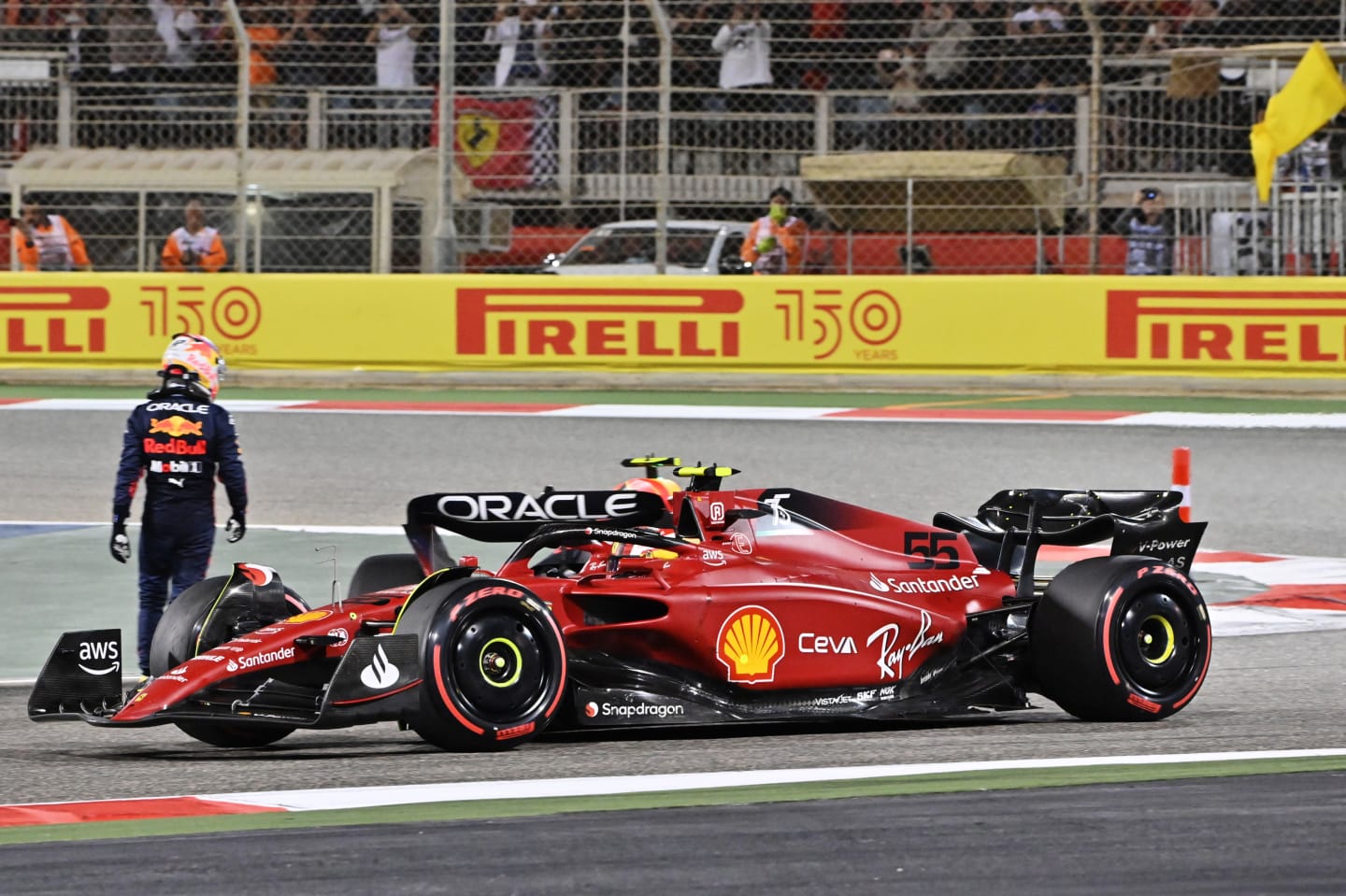 BAHRAIN, BAHRAIN - MARCH 20: Carlos Sainz of Spain driving (55) the Ferrari F1-75 passes Sergio