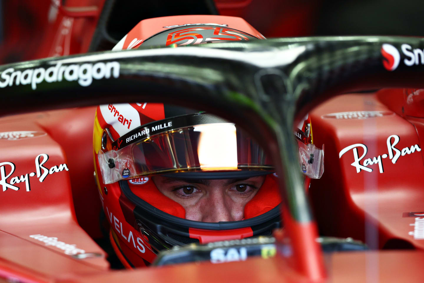 BAHRAIN, BAHRAIN - MARCH 12: Carlos Sainz of Spain and Ferrari prepares to drive in the garage