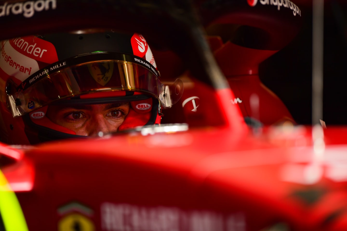 BAHRAIN, BAHRAIN - MARCH 10: Carlos Sainz of Spain and Ferrari prepares to drive in the garage