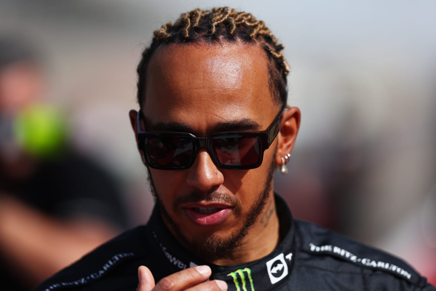 BAHRAIN, BAHRAIN - MARCH 10: Lewis Hamilton of Great Britain and Mercedes looks on during Day One