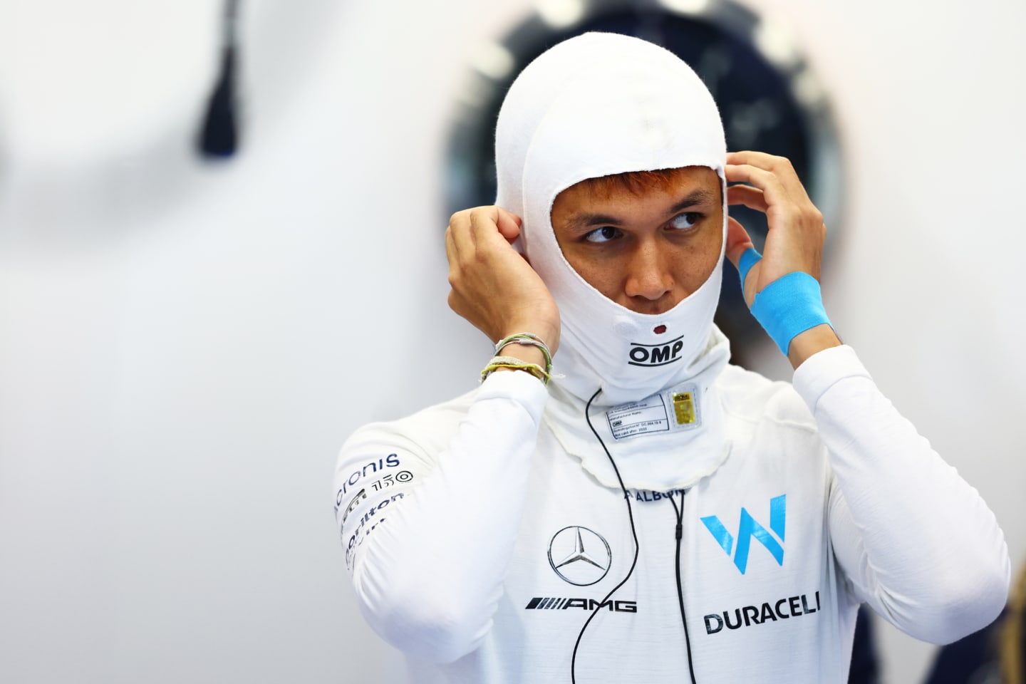 SPA, BELGIUM - AUGUST 26: Alexander Albon of Thailand and Williams prepares to drive in the garage