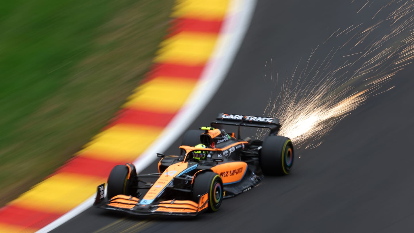 SPA, BELGIUM - AUGUST 26: Sparks fly behind Lando Norris of Great Britain driving the (4) McLaren